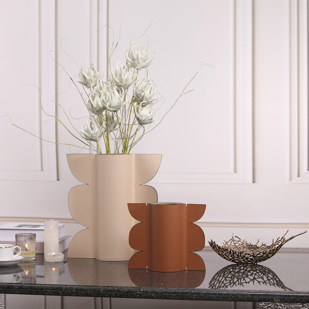 Leather vase by BEACON with a sleek, textured design suitable for dry or fresh floral arrangements.