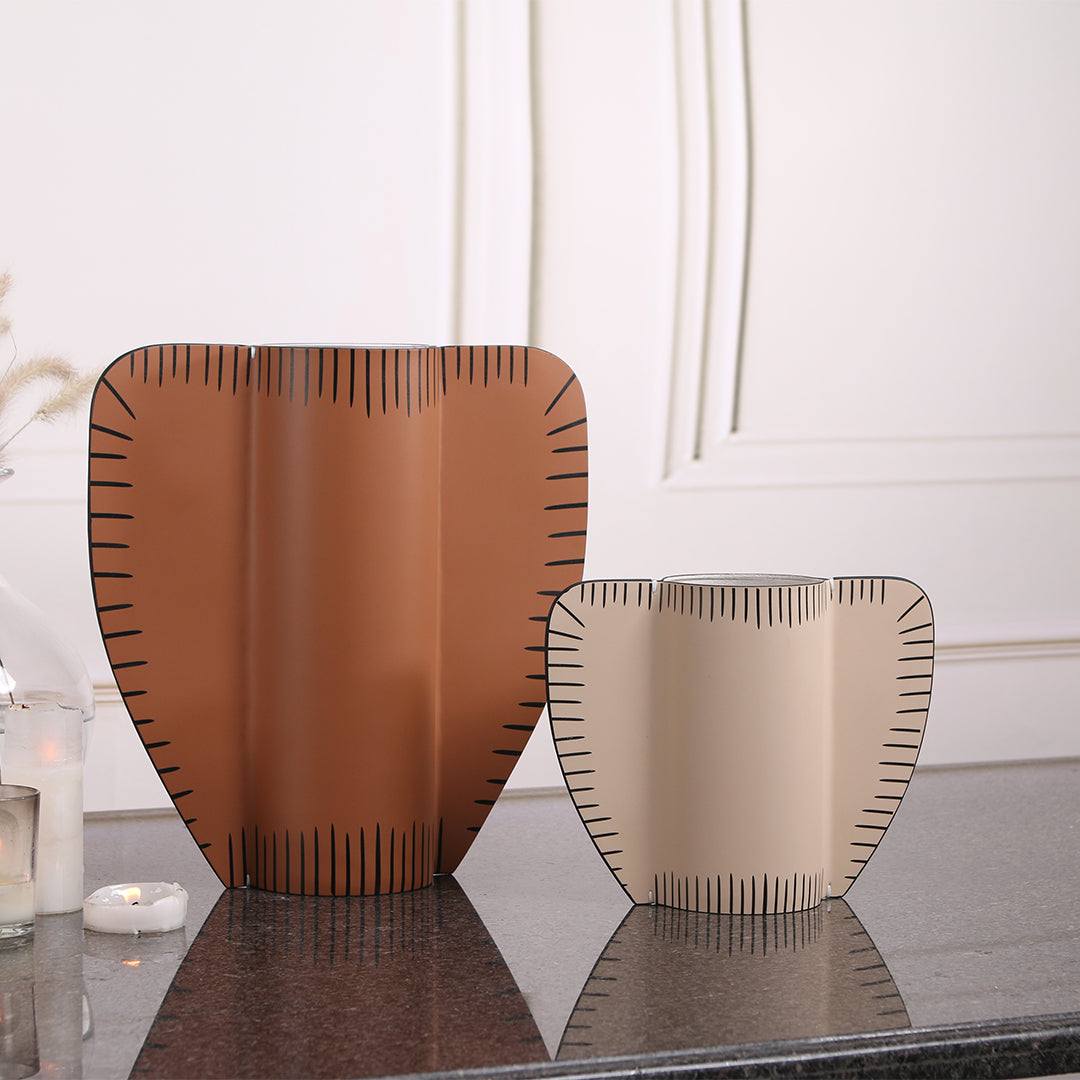 Leather vase from BEACON, designed for dry and fresh flowers, featuring a sleek, textured leather exterior and modern vase shape.