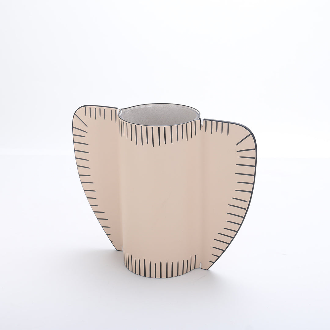 Leather vase from BEACON, dry and fresh style, designed for decorative use, featuring a textured leather surface and modern shape.