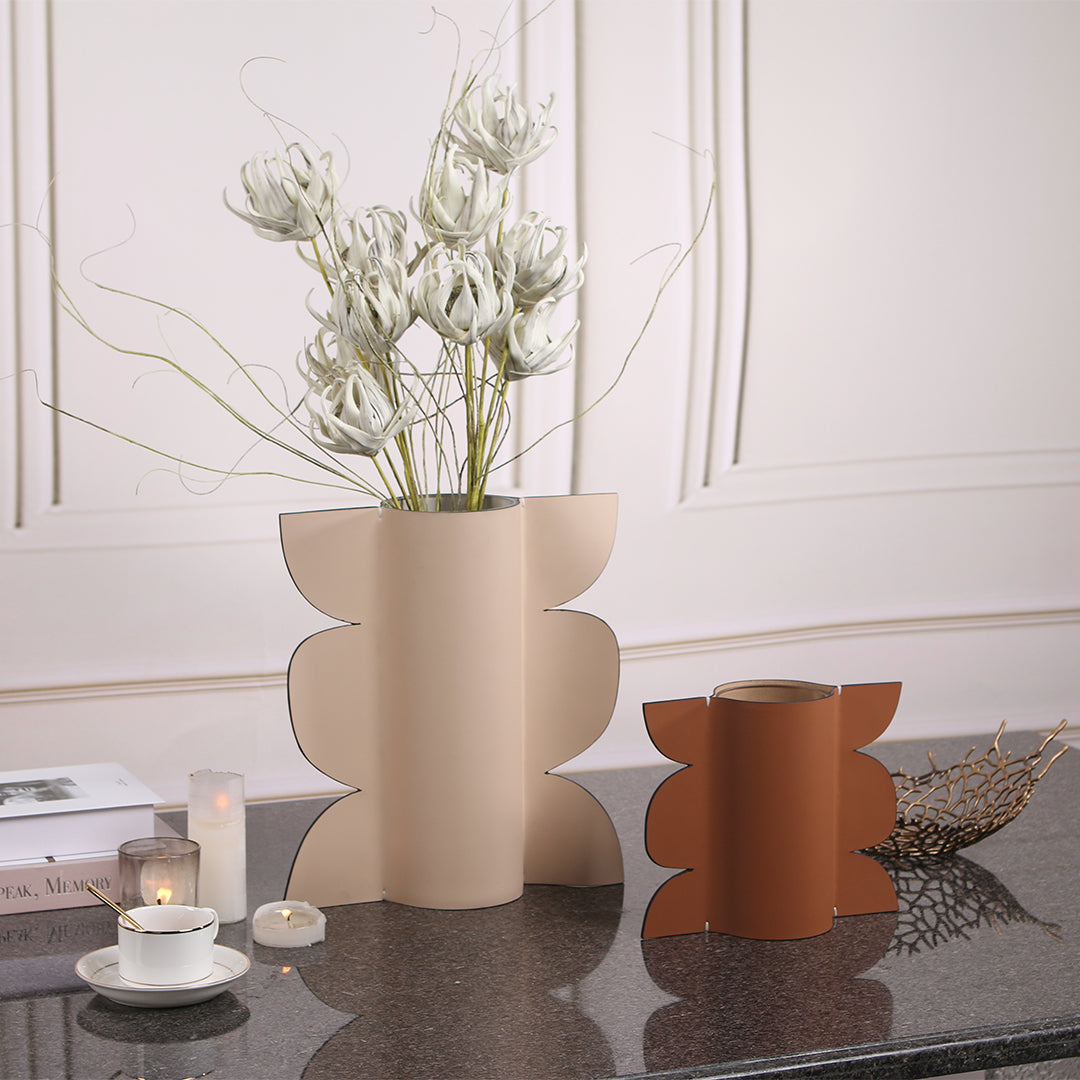 Leather vase by BEACON, dry and fresh finish, designed for decorative floral arrangements, with a sleek leather exterior.