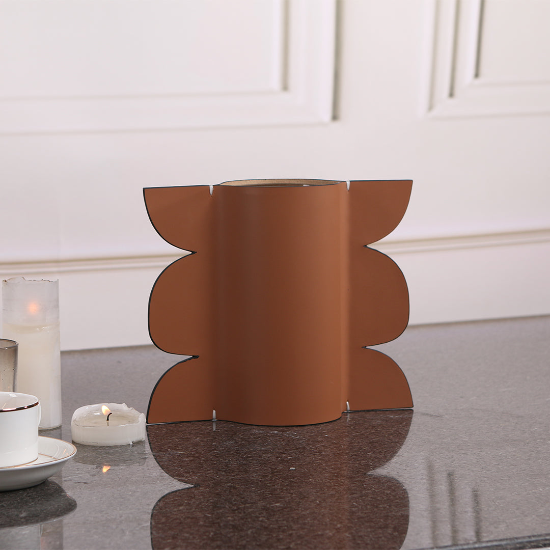 Leather vase by BEACON with a sleek, textured design suitable for dry or fresh floral arrangements.