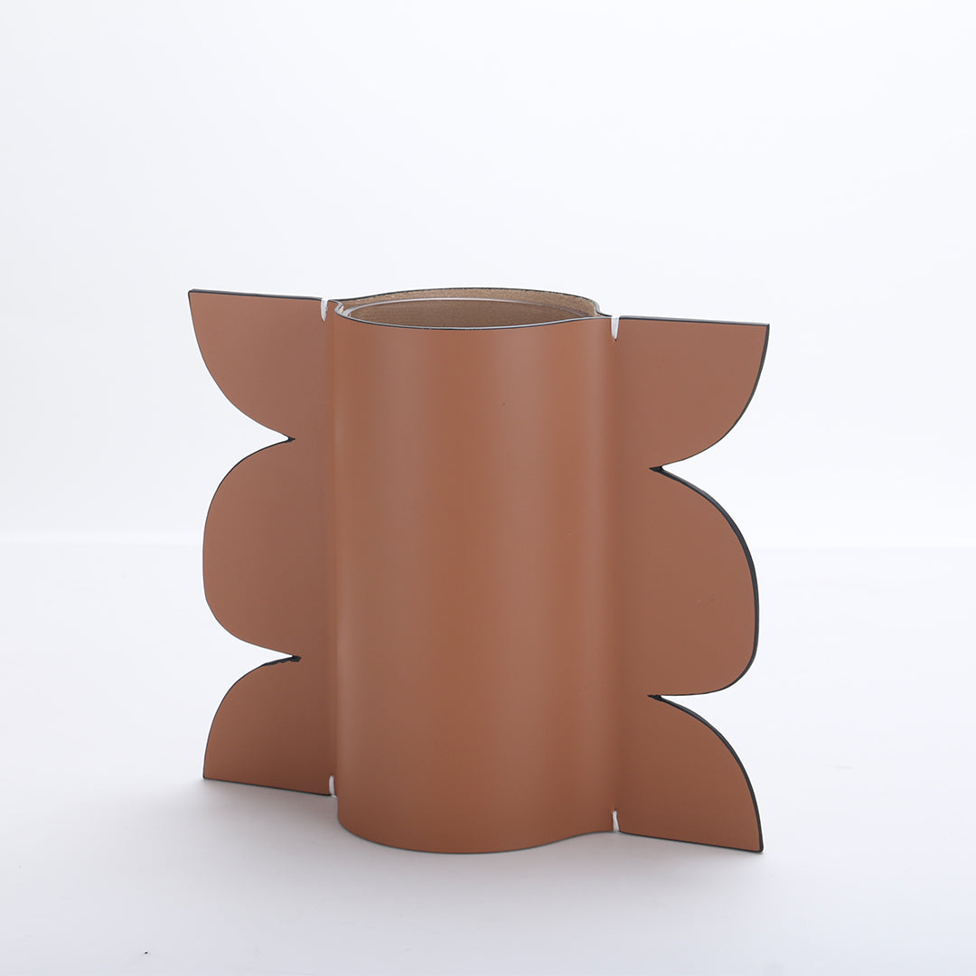 Leather vase from BEACON, designed for dry and fresh flowers, featuring a sleek, textured leather exterior.