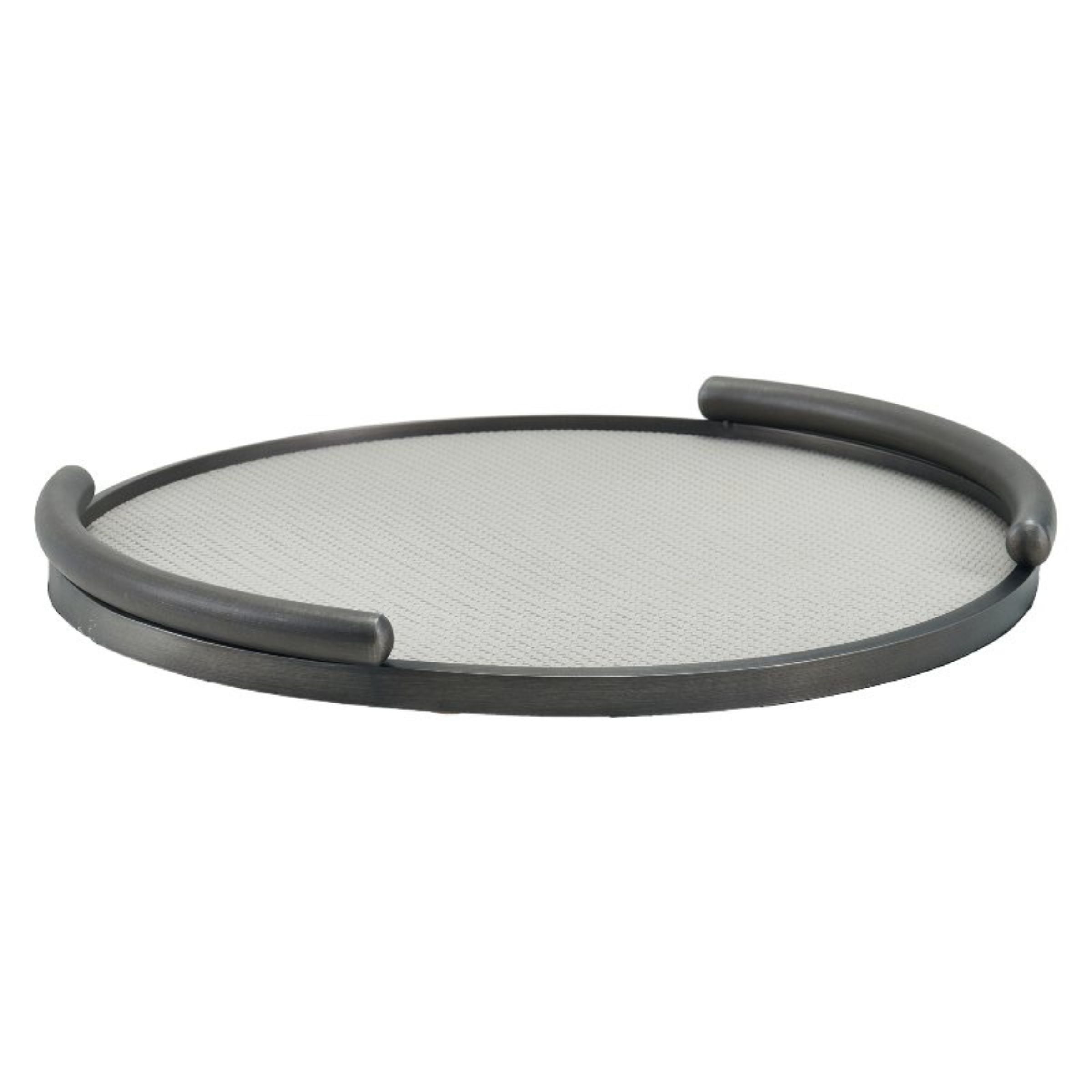 Light grey brushed metal round leather tray by Beacon, featuring a sleek design with leather accents and sturdy construction.