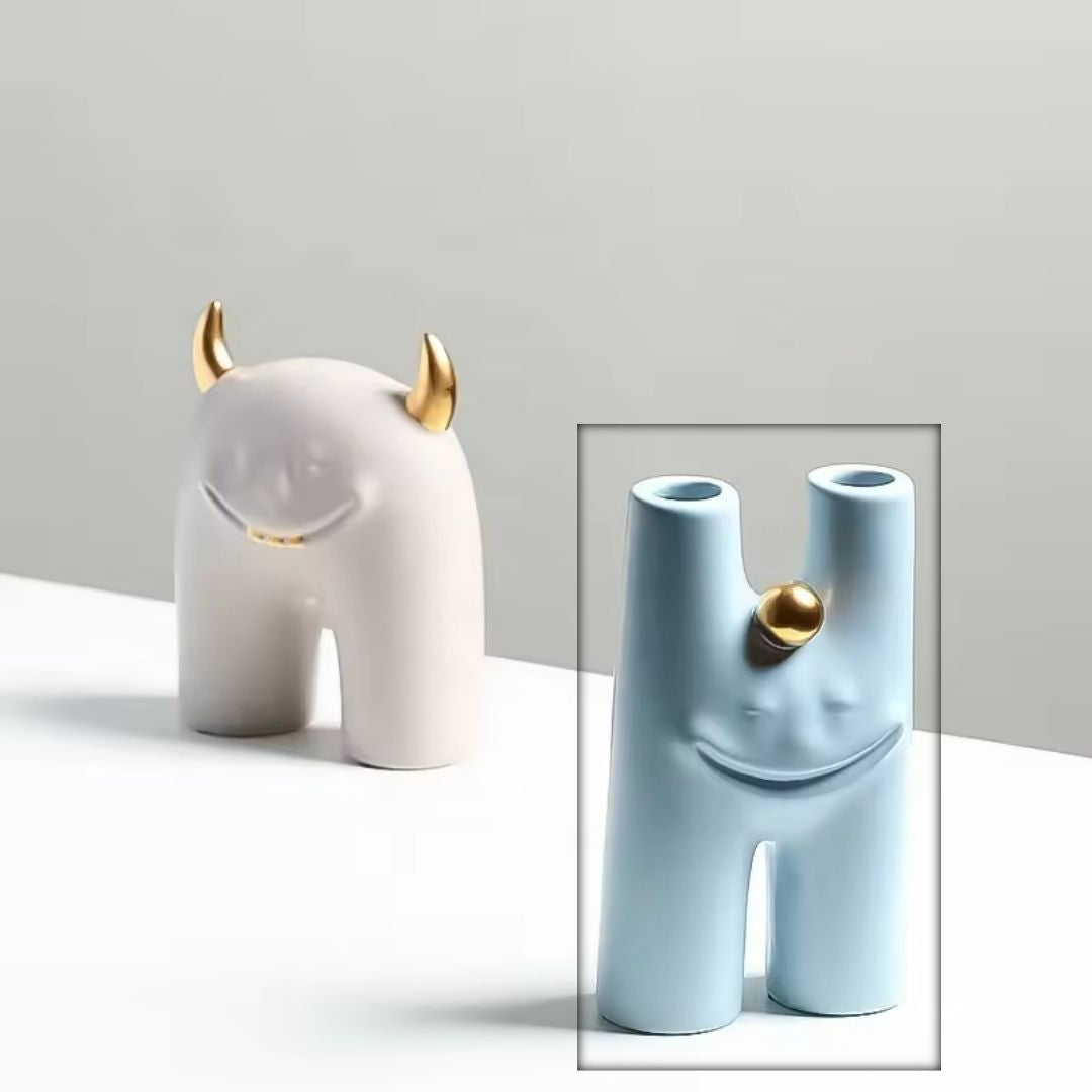 Little Monster H figurine by BEACON, a playful home decor decorative figurine with colorful details.