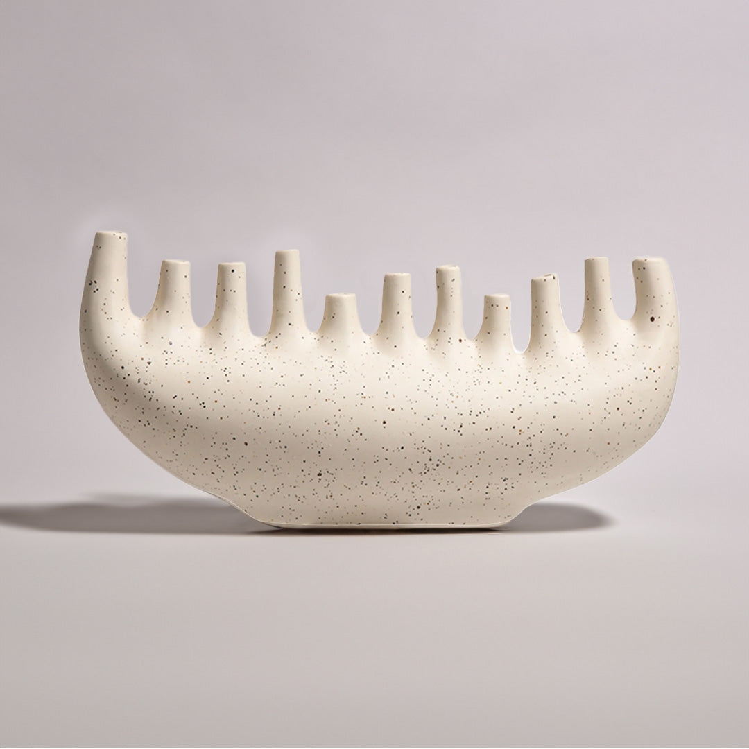 Long ceramic vase from BEACON with a sleek, tall design, perfect for modern home decor and floral arrangements.