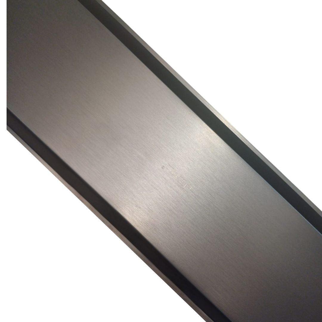 Long bathroom floor drain in stainless steel, 60x7cm, designed for bathroom accessories by BEACON.