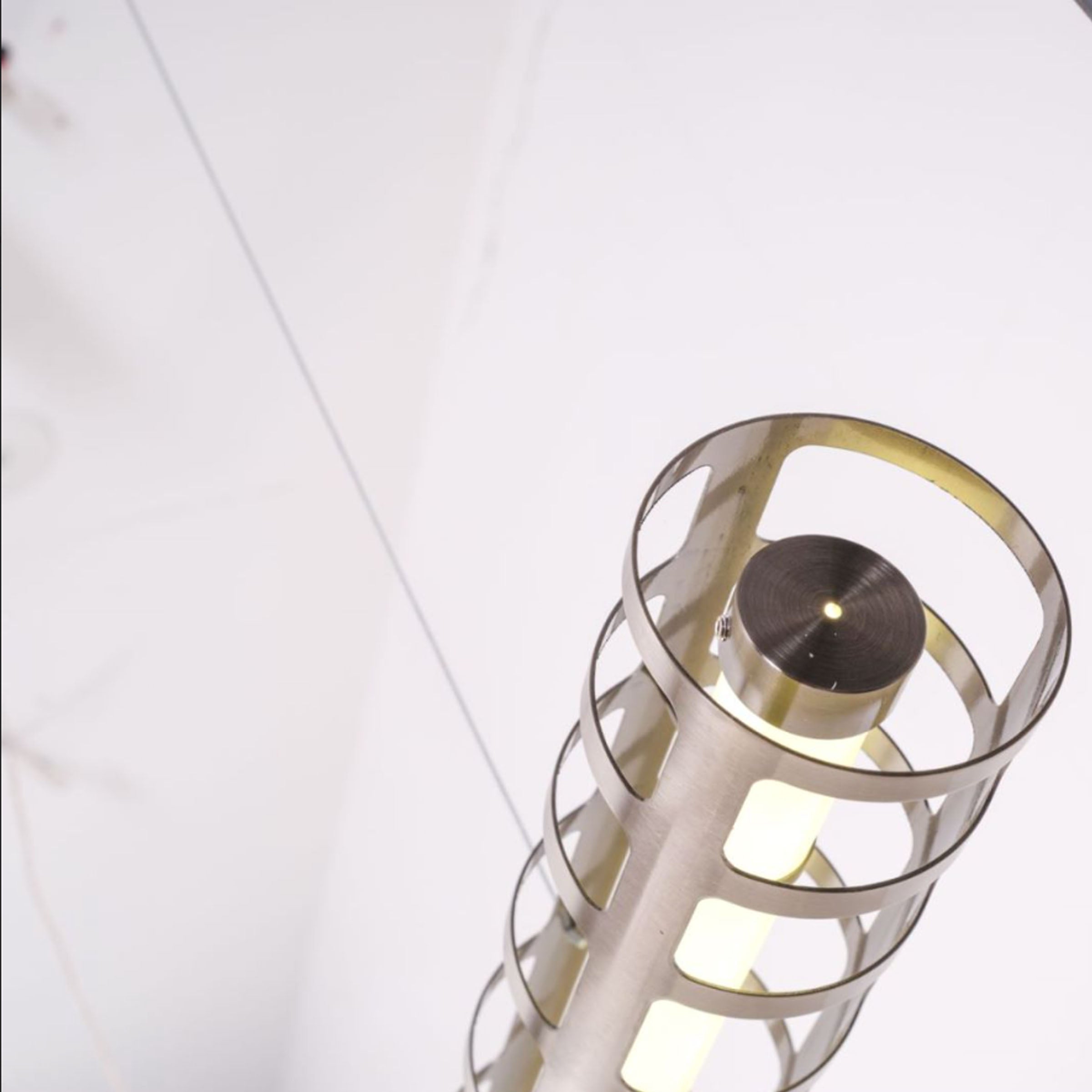 Black Luminous Thread Pendant Lamp by BEACON, modern pendant lighting with glowing thread design for stylish interior illumination.