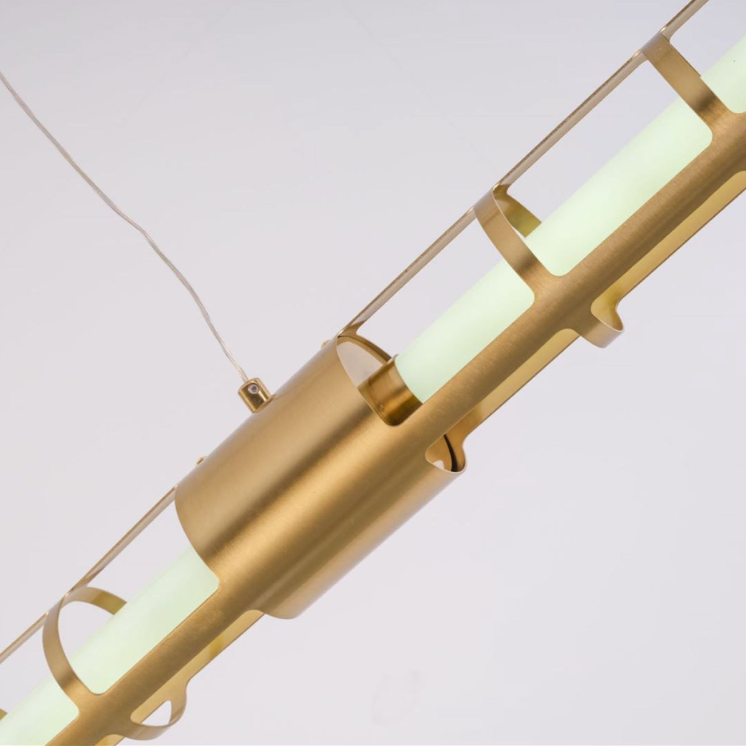 Luminous Thread Pendant Lamp by BEACON in gold with intricate thread design, perfect for modern interior lighting.