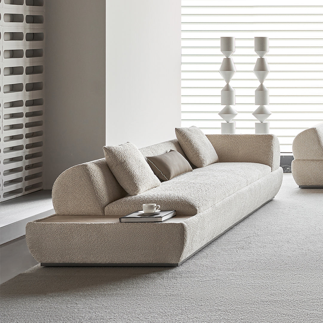 Lylia 2-seater right arm sofa module with travertine side table by BEACON, showcasing modern outdoor seating and elegant design.