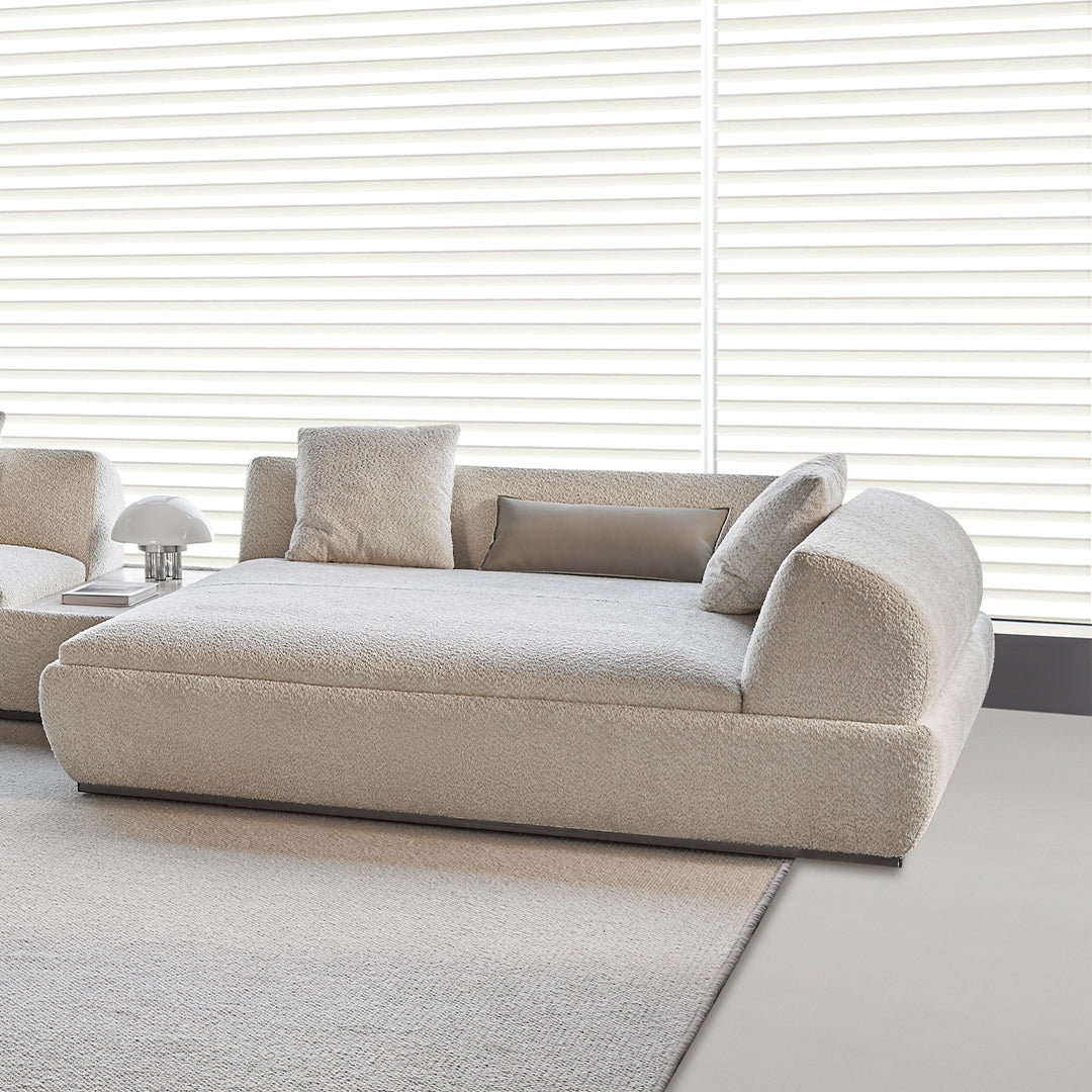 BEACON Lylia chaise module with travertine side table, modern sofa piece featuring sleek design and stylish accent table.