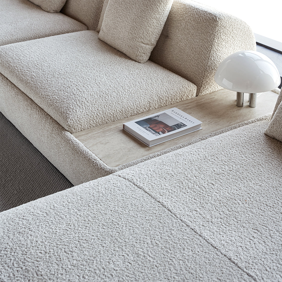 Lylia single seater sofa module with a travertine side table by BEACON, modern design, beige upholstery, and sleek style.