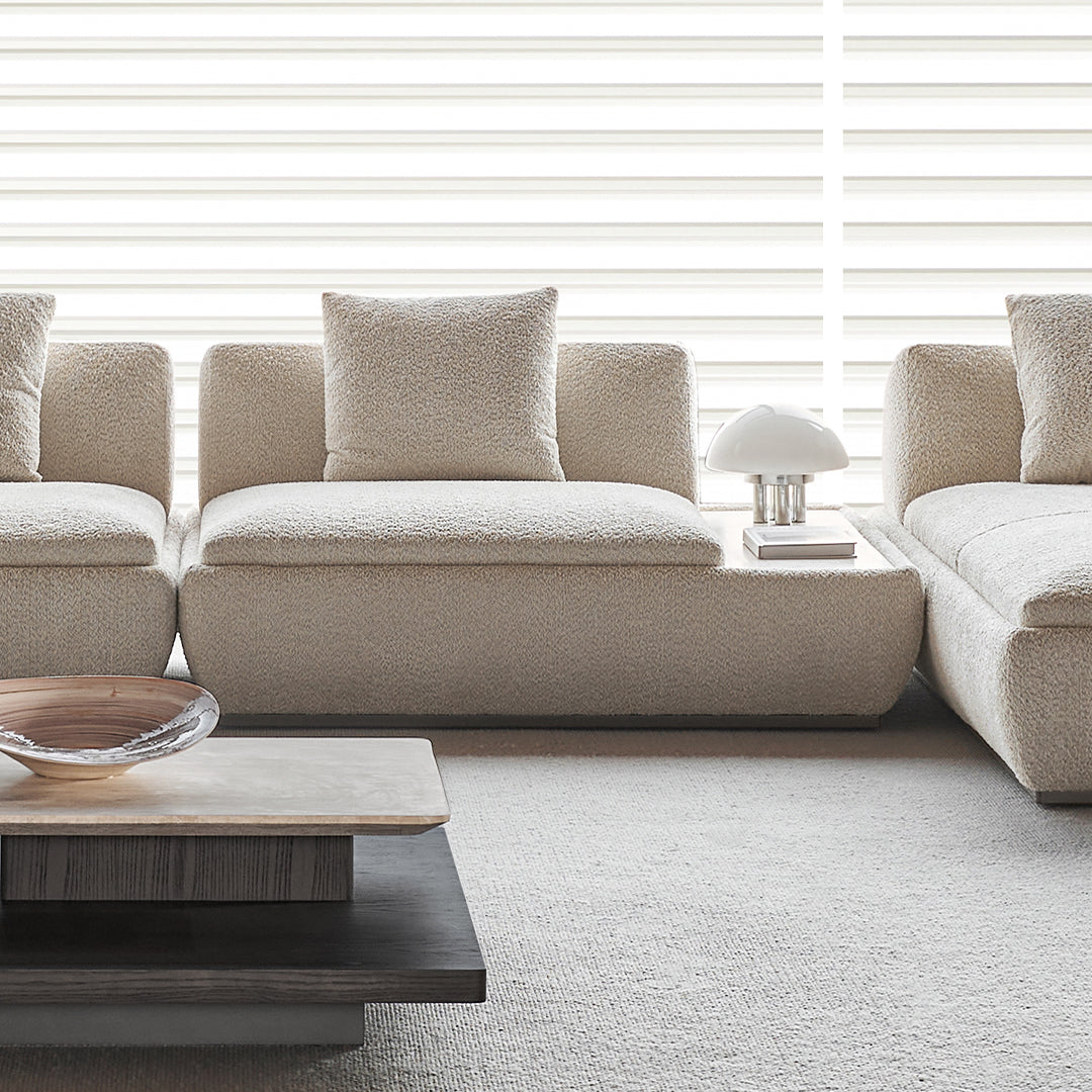 BEACON Lylia single seater sofa module with travertine side table, modern design and comfortable seating.