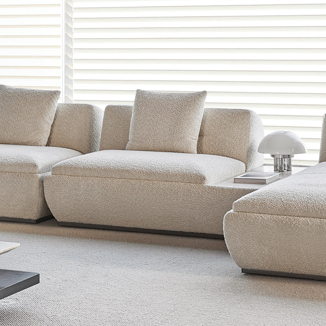 BEACON Lylia single seater sofa module with travertine side table, modern design and neutral upholstery, perfect for stylish living spaces.