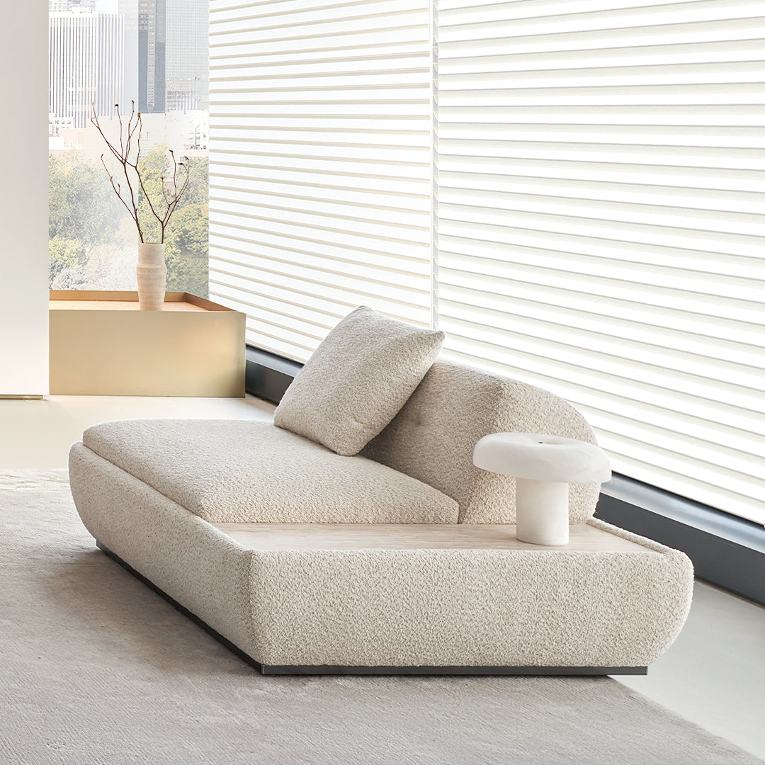 BEACON Lylia single seater sofa module with a travertine side table, modern design, comfortable seating, and stylish accent piece.