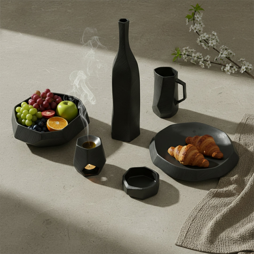 Black volcanic chiseled ceramic jug, MINGXIANG CERAMICS drinkware with textured, rugged surface and ergonomic handle.