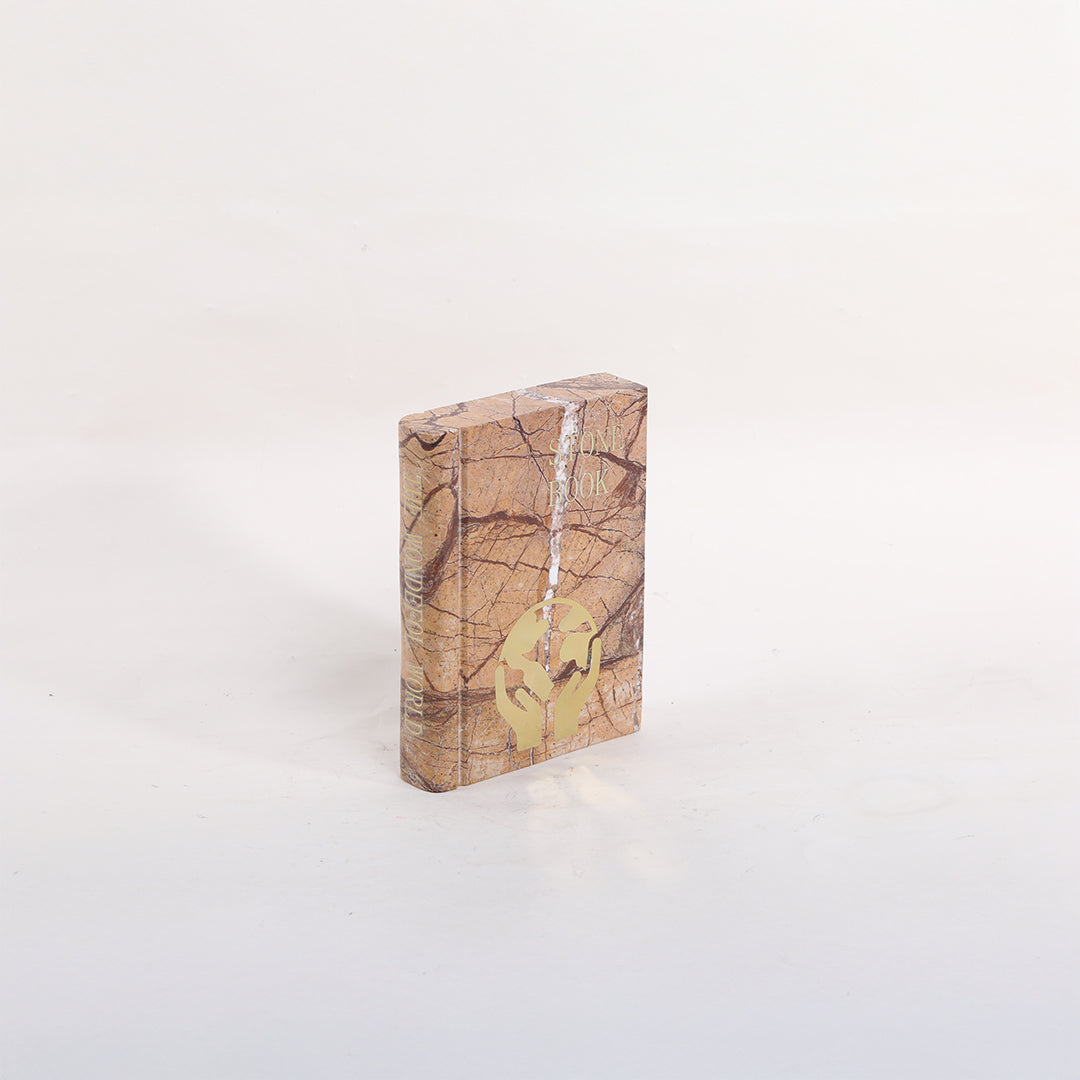 Marble book sculpture from BEACON home decor figurines collection, showcasing a sleek, polished marble book-shaped figurine.
