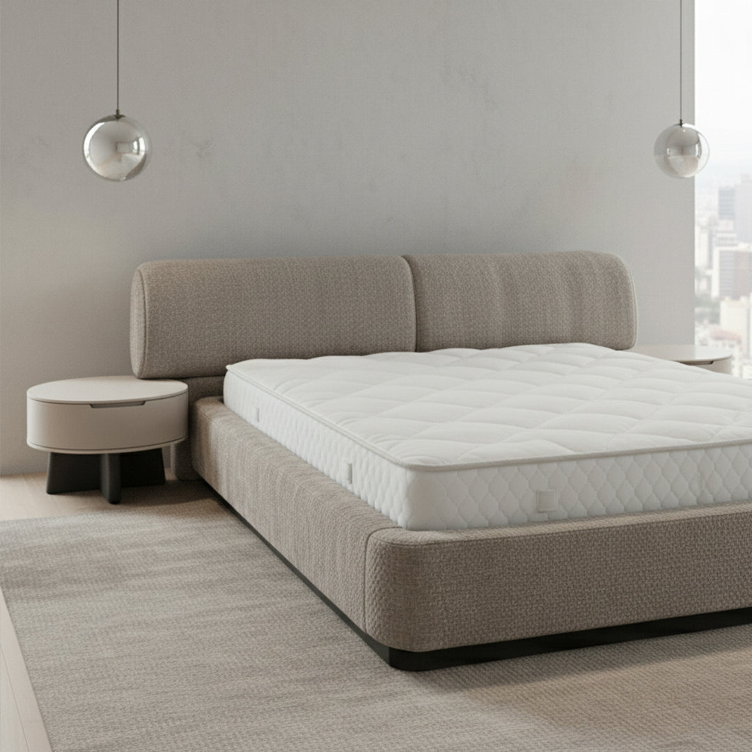 Ecole Living Marmo Bedstead showing a modern wooden bed frame with a sleek, minimalist design in a bedroom setting.