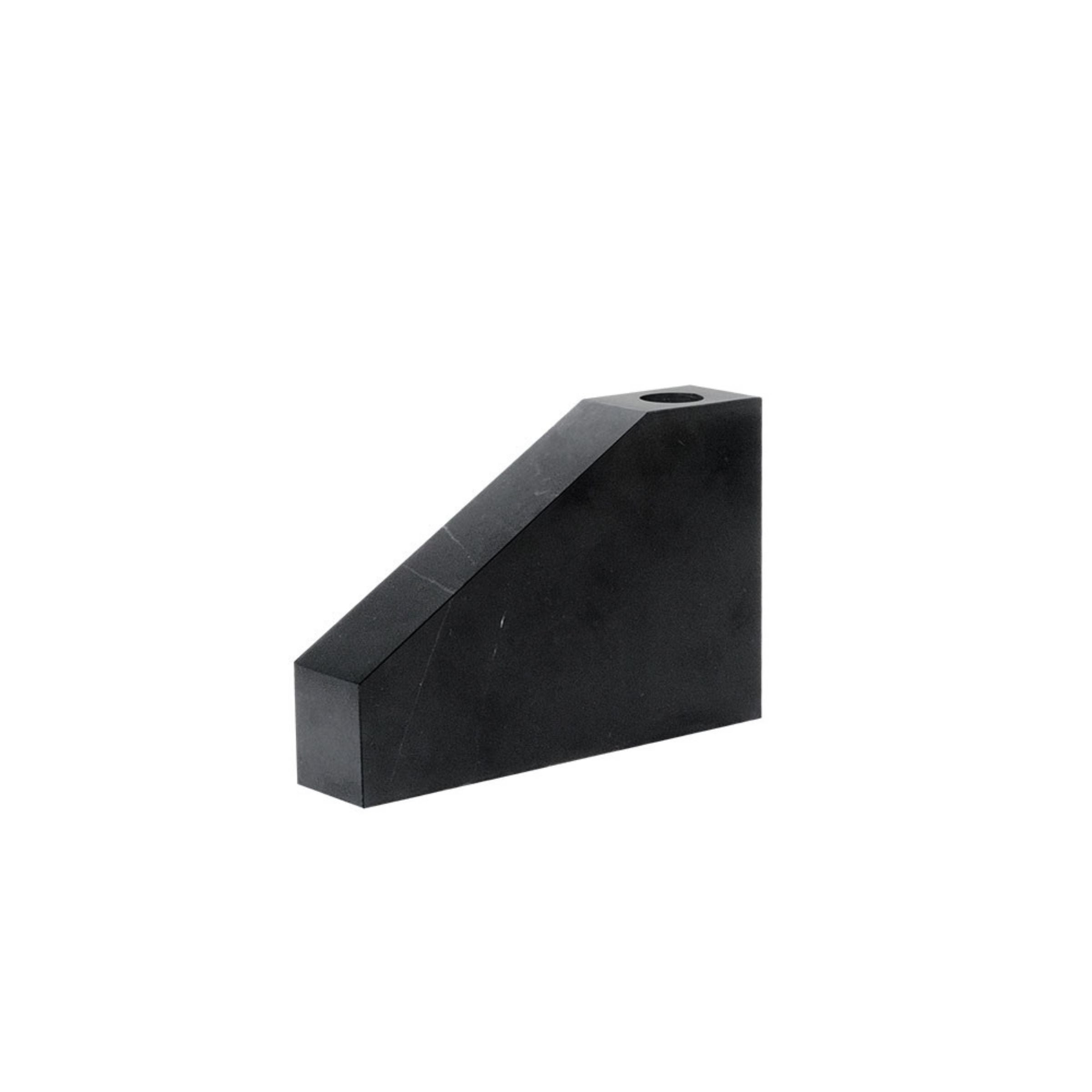 Marquina black and white marble trapezoidal vase with short floral arrangement, stylish home decor by BEACON LHDG.