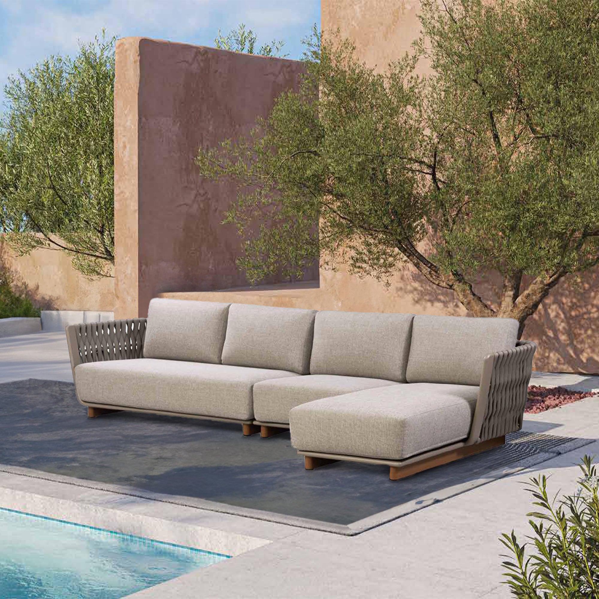 BEACON Marrakech outdoor single seater sofa in natural rattan with plush cushion, perfect for patio or garden seating.