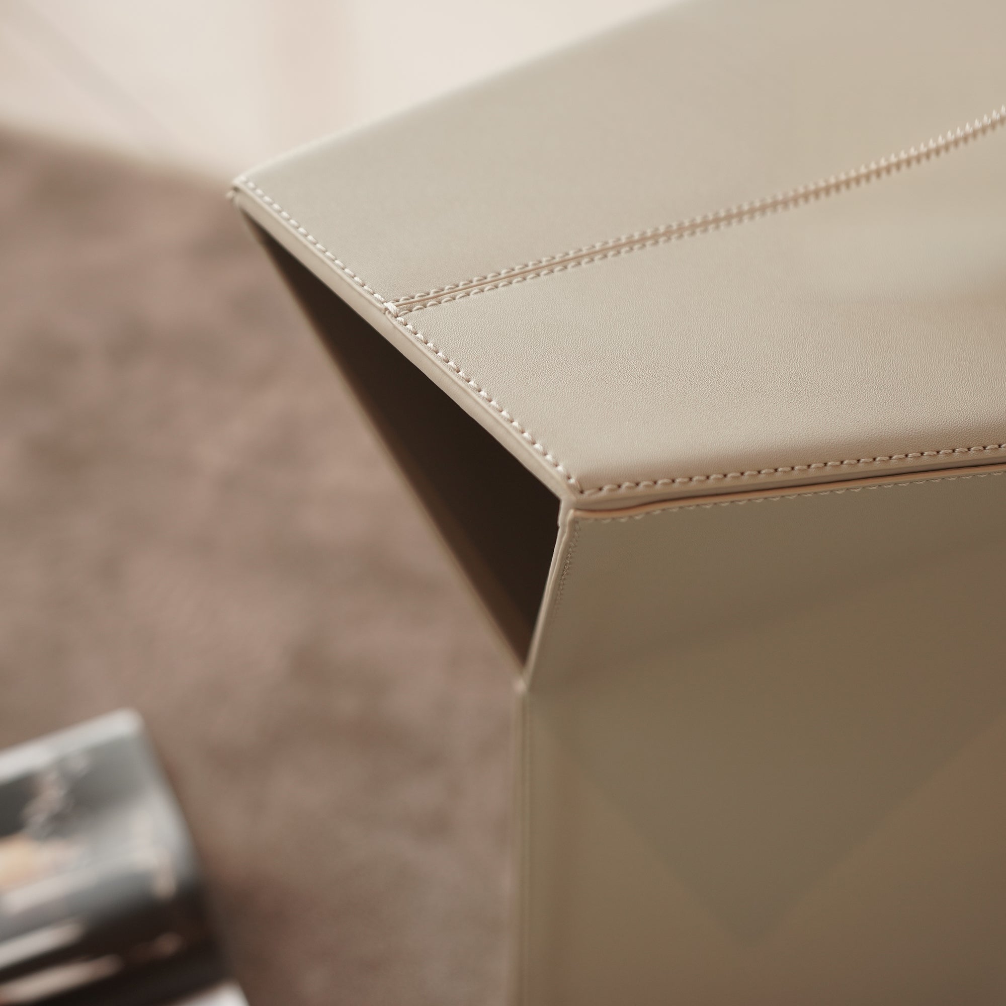 Beige microfiber saddle leather side table and low stool by BEACON, versatile pouf with stylish saddle leather design.