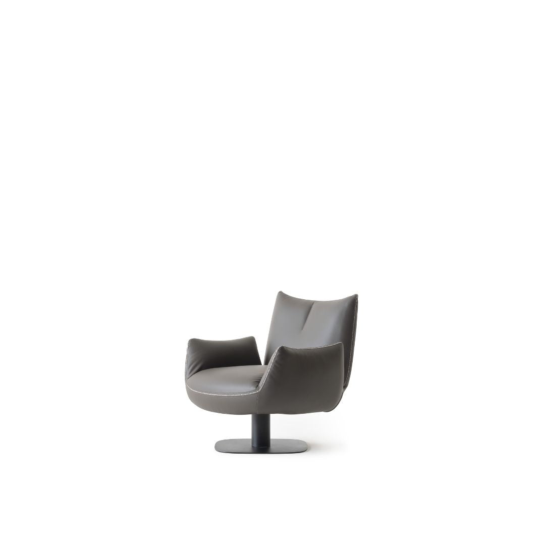 YOL LIVING Mila Amara armchair with plush fabric upholstery and modern design, featuring a comfortable cushioned seat and armrests.