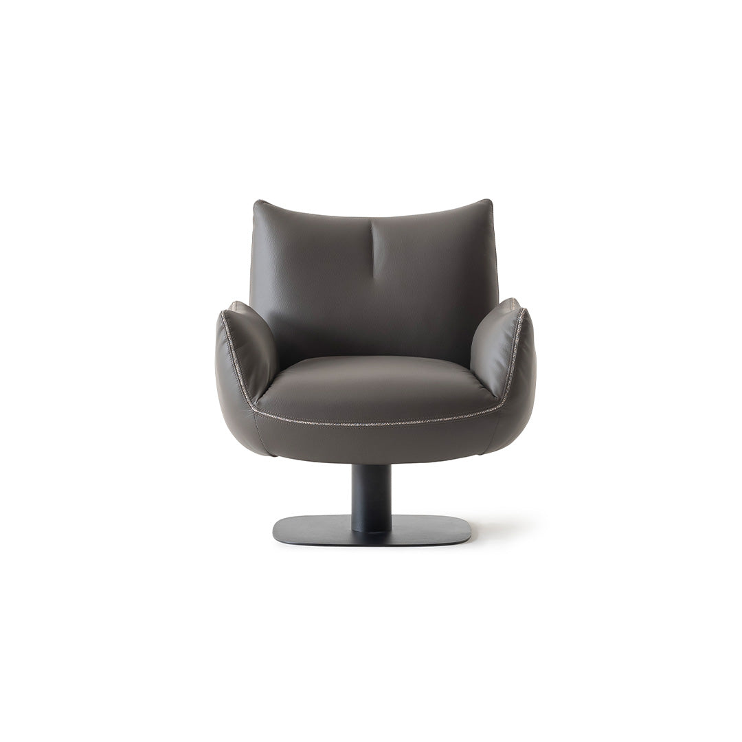 YOL LIVING Mila Amara armchair with plush fabric upholstery and modern design, featuring a comfortable backrest and armrests.