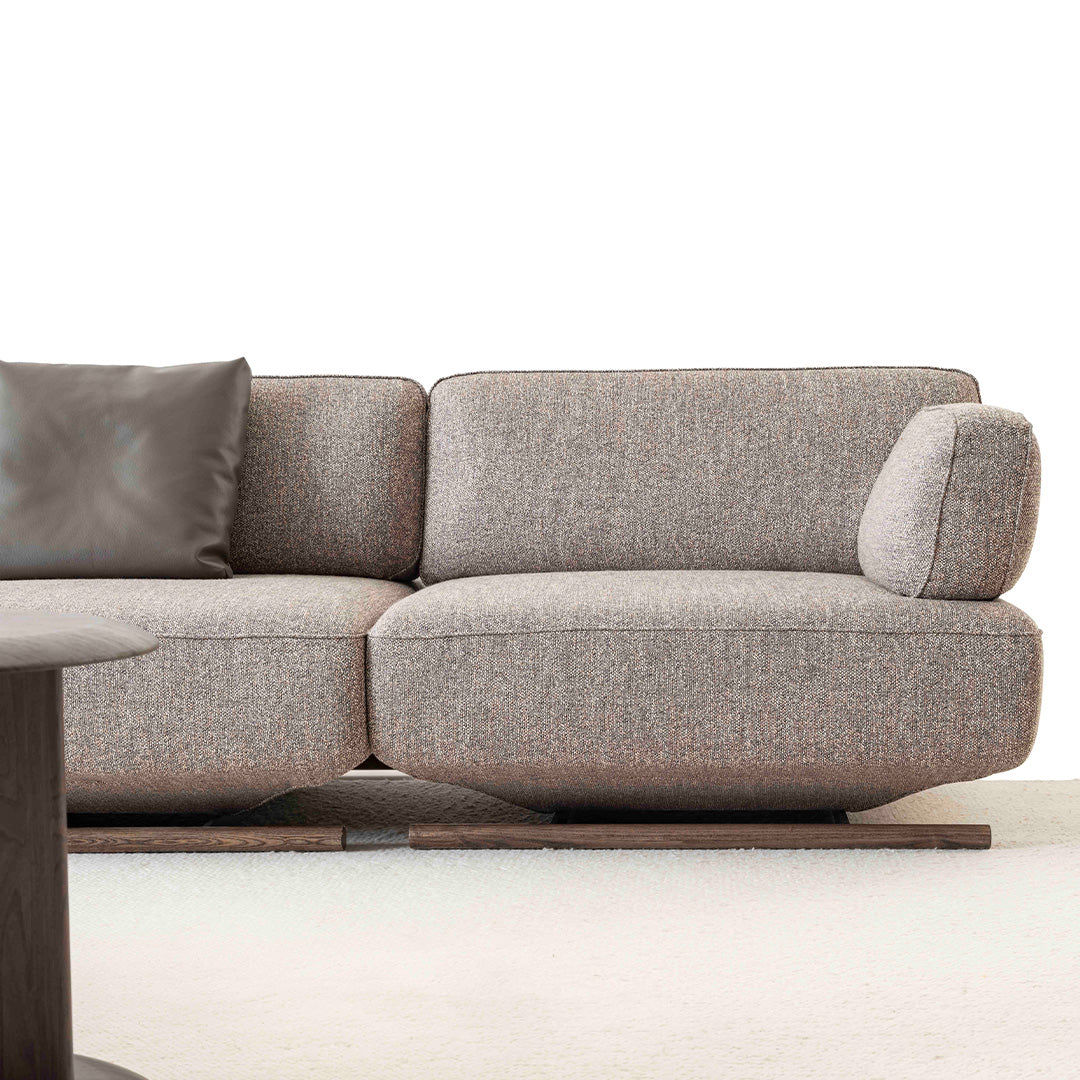 YOL Living MILA sofa module with right arm in a modern living room setting, showcasing the sleek design and upholstery.