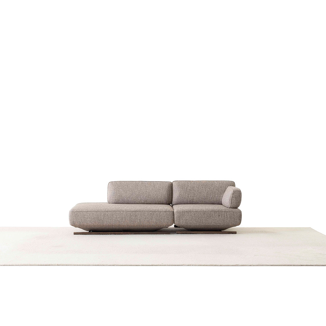 YOL LIVING MILA sofa module with right arm in a modern living room setting, showcasing the beige fabric and sleek design.