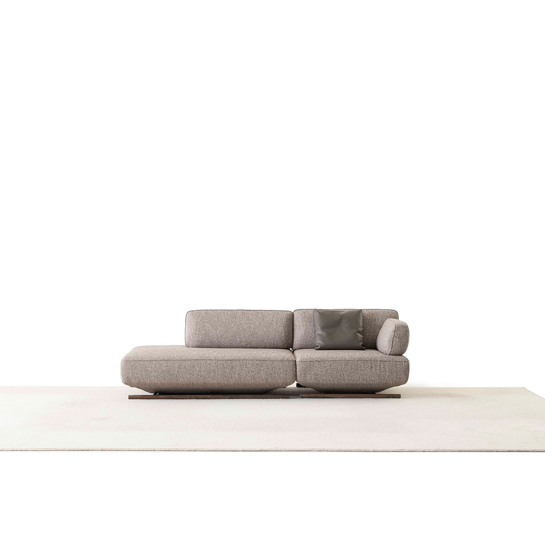 YOL LIVING MILA sofa module with right arm in a modern living room setting, showcasing its stylish design and fabric upholstery.