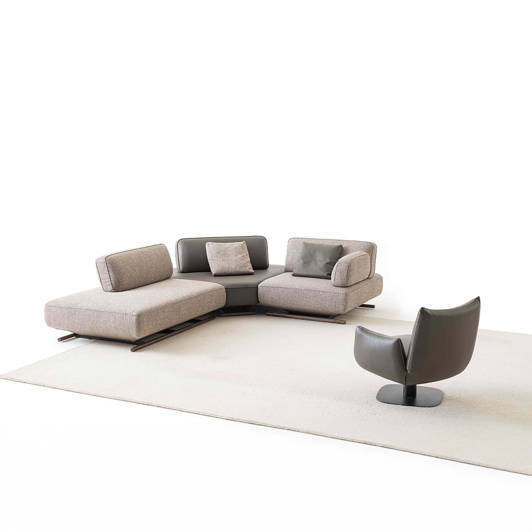 YOL Living MILA module sofa with right arm in a modern living room setting showing the beige fabric and sleek design.