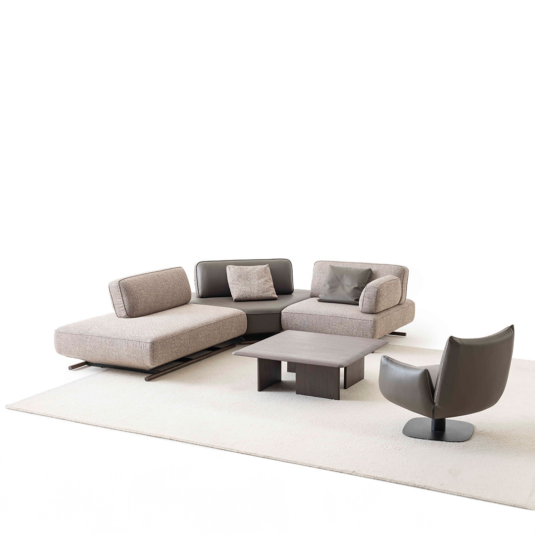 YOL LIVING MILA sofa module with right arm in a modern living room setting, showcasing its sleek design and comfortable seating.