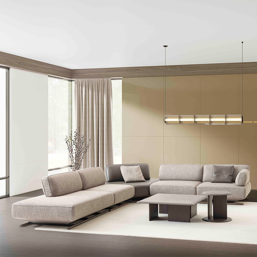 YOL Living Mila Module Sofa without arm in a modern living room setting, showcasing sleek design and fabric upholstery.