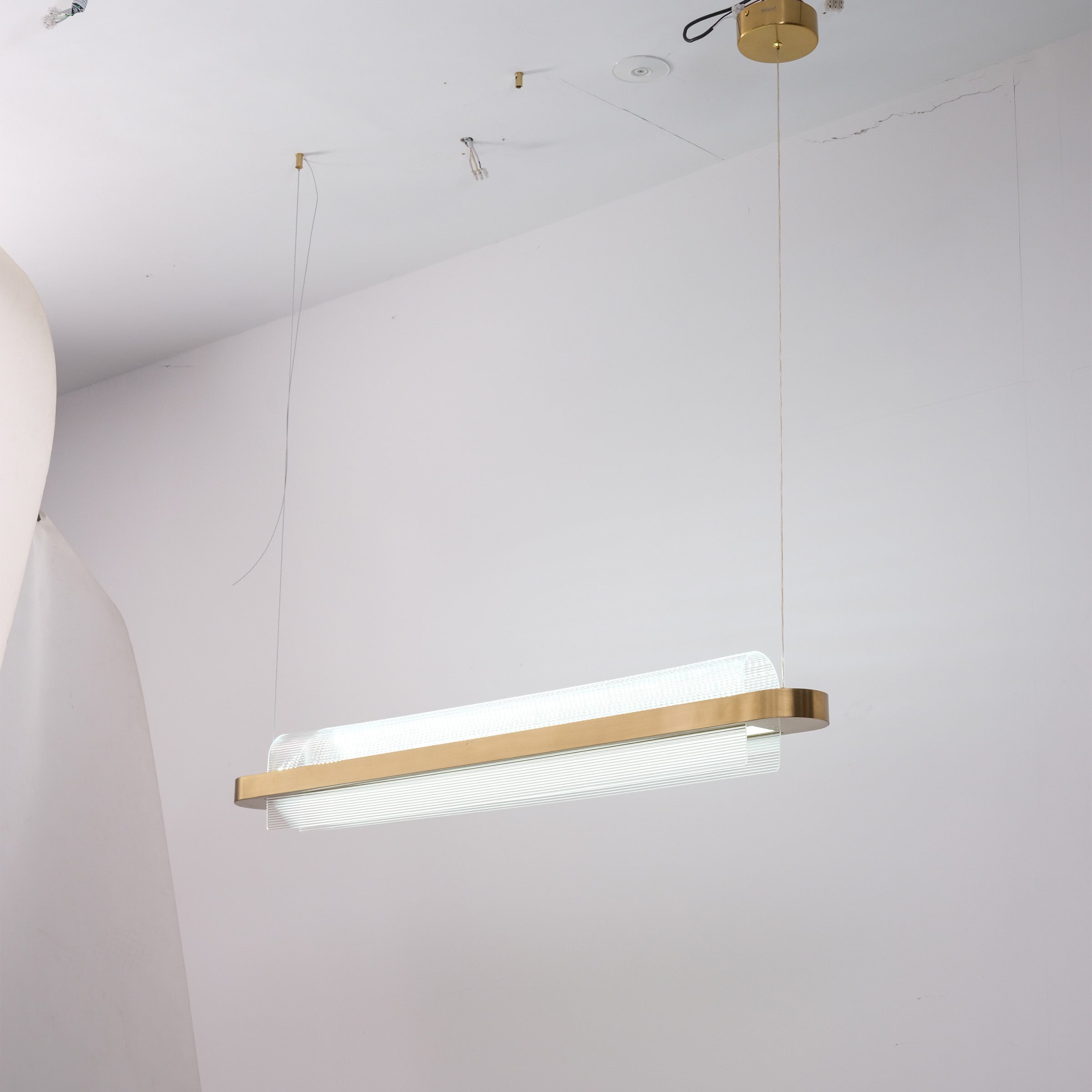BEACON Molten Pearl Pendant Lamp CY-DD-1061 with glossy, pearl-like finish, modern design, hanging from a ceiling fixture.