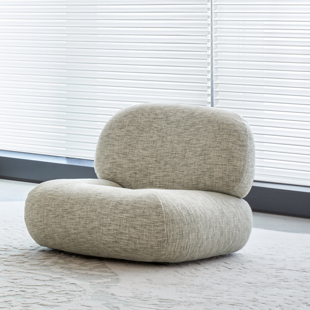 Beacon Monarch Armchair AMCJ-DY6019 with plush fabric, cushioned seat, and curved armrests, ideal for modern living rooms.