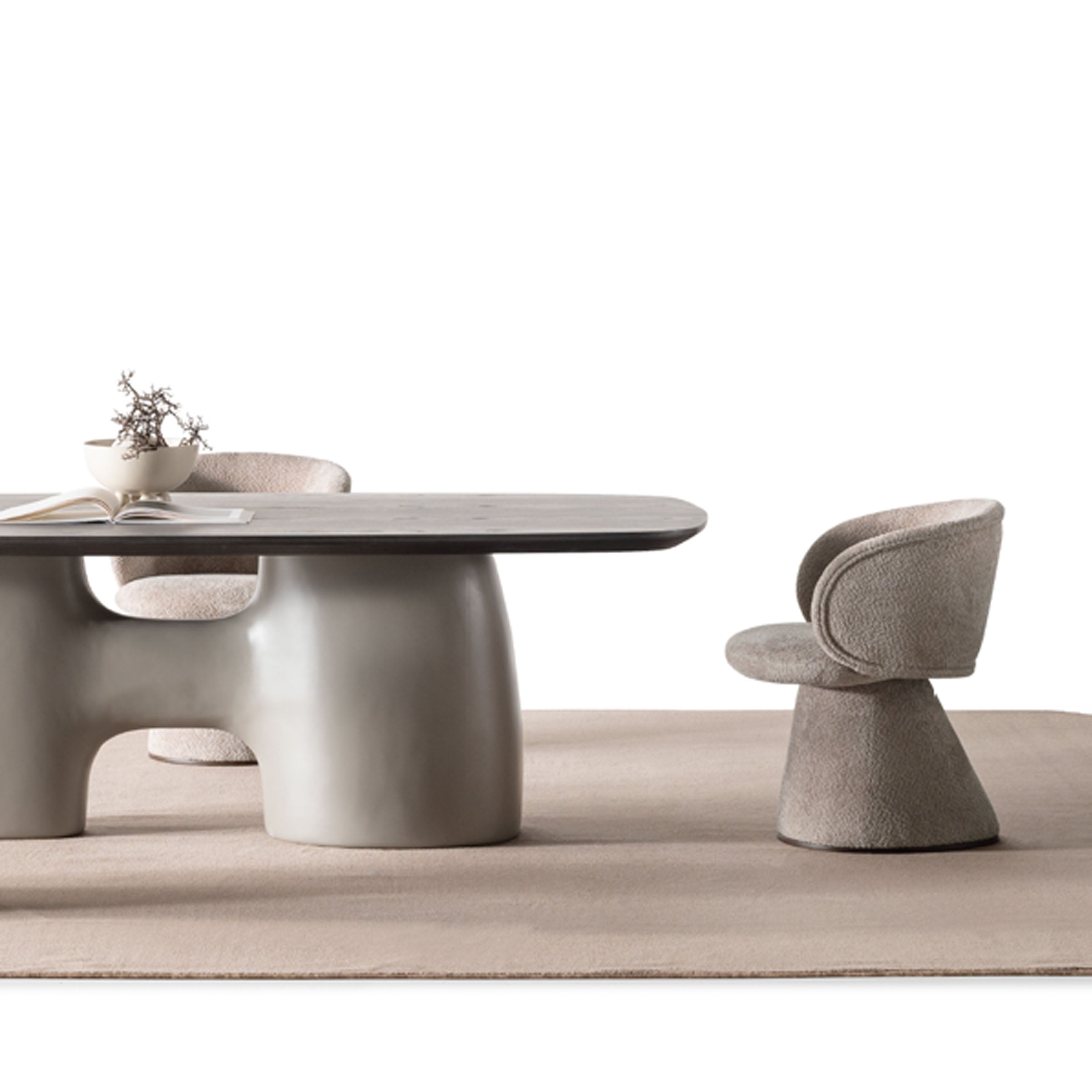 SARDUNYA MOON swivel dining chair with a rounded seat and backrest, featuring a sleek modern design in a neutral finish.