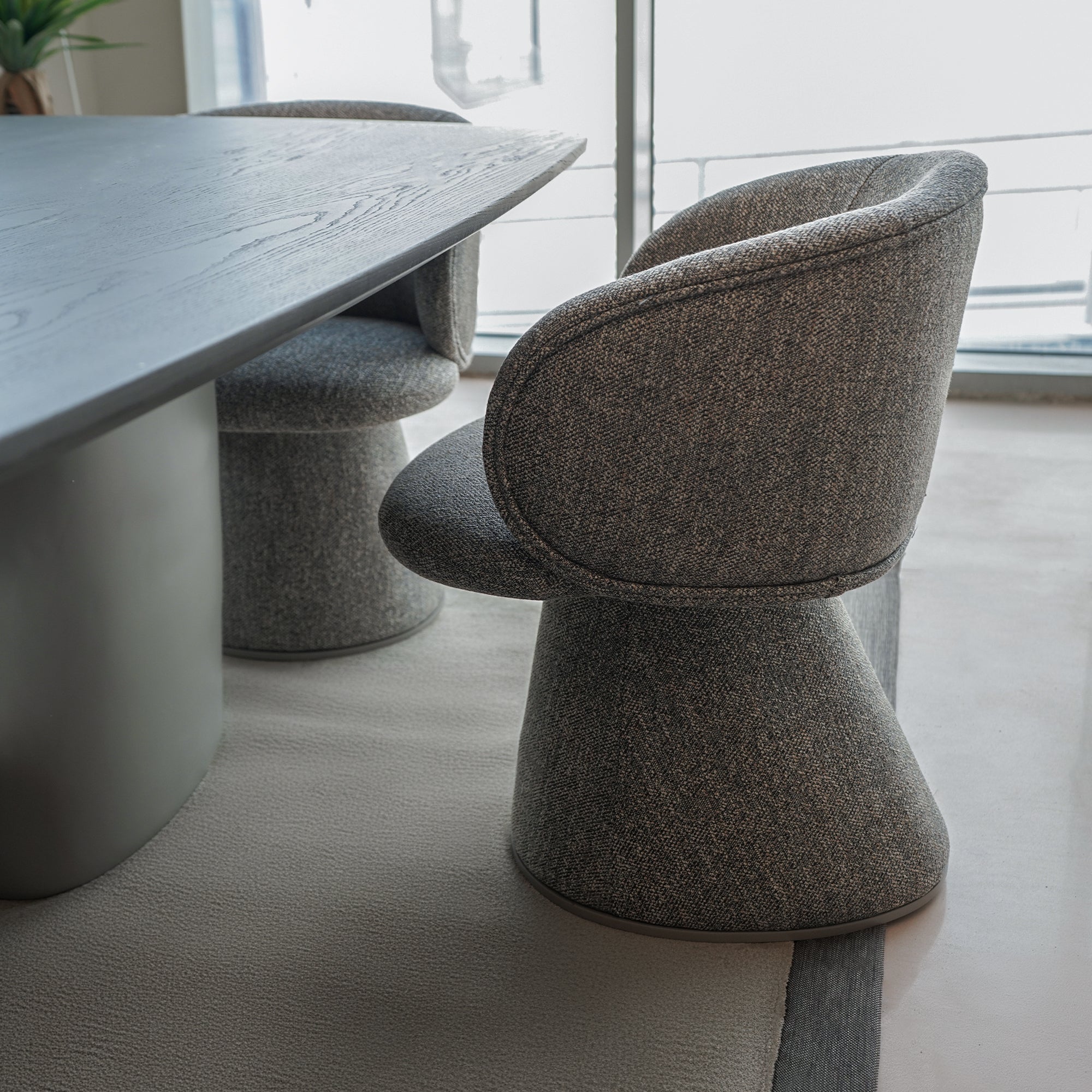 SARDUNYA MOON Swivel Dining Chair OW 405-12 with a modern design and cushioned seat, perfect for contemporary dining spaces.