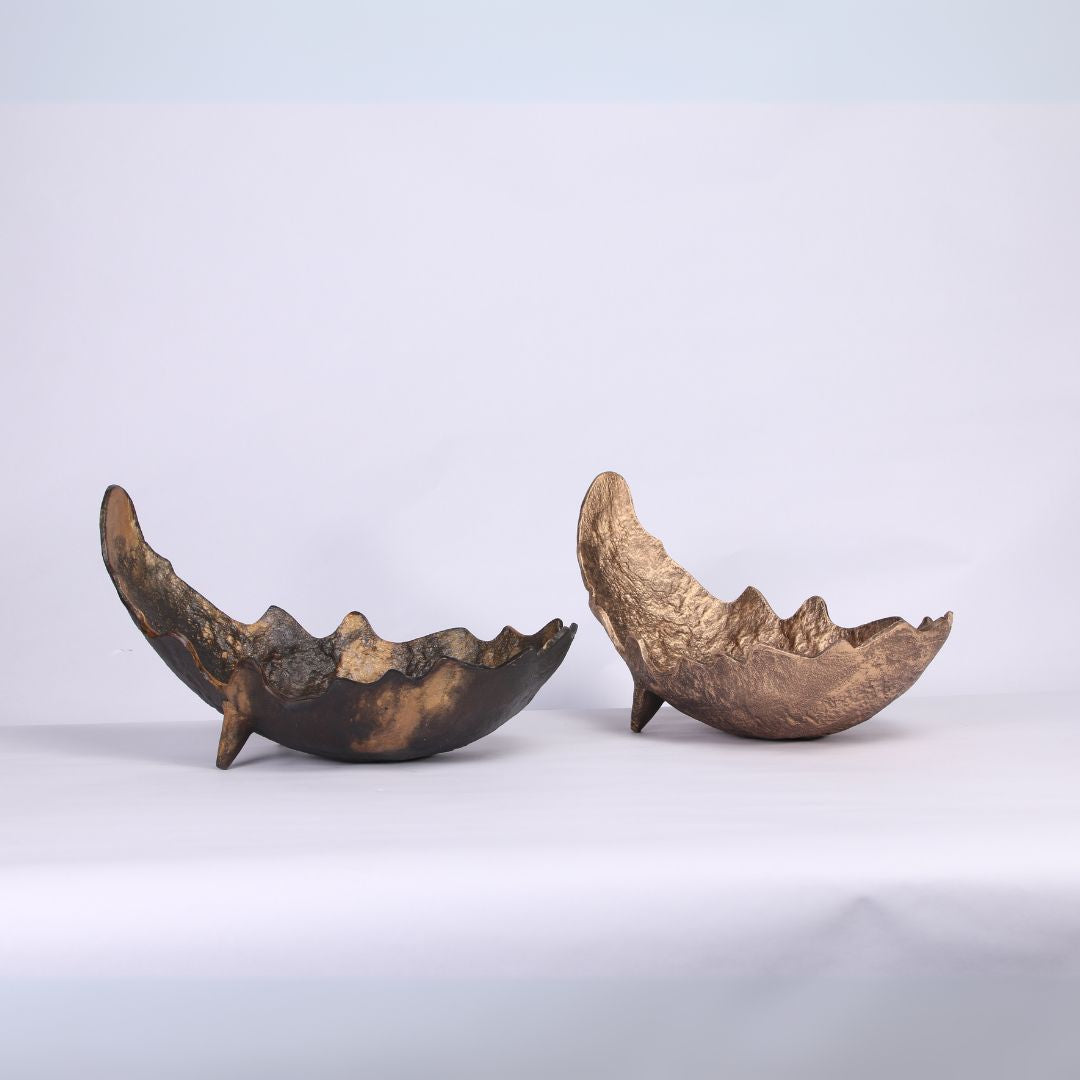 Moon-shaped metal tray from BEACON, perfect for serving or decorative use, featuring a sleek, modern design.