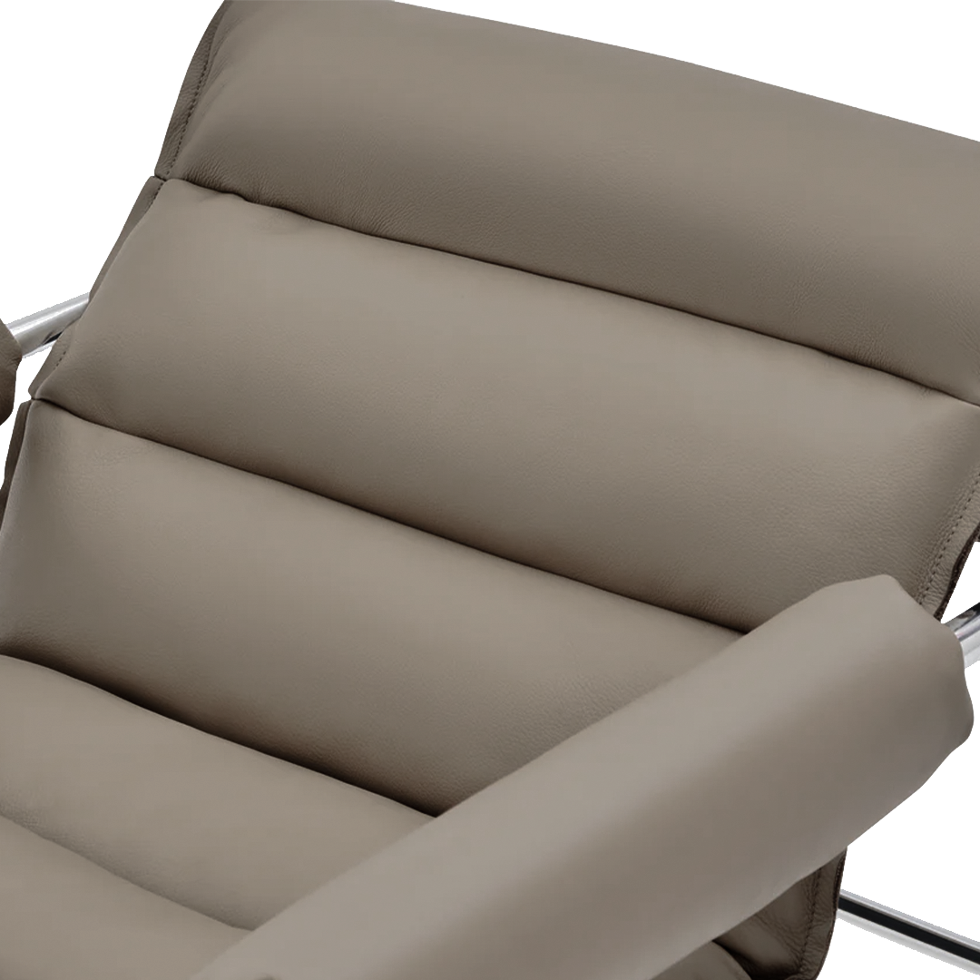 Beige Murcia leather lounge chair by BEACON with plush cushioning and sleek design, perfect for modern living rooms.
