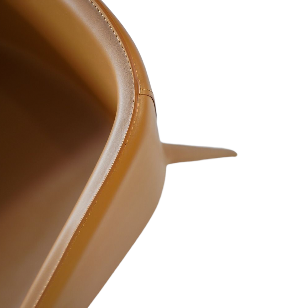 Mycroft Caramel Lounge Chair by BEACON, stylish and comfortable seating with a modern design, perfect for living rooms.