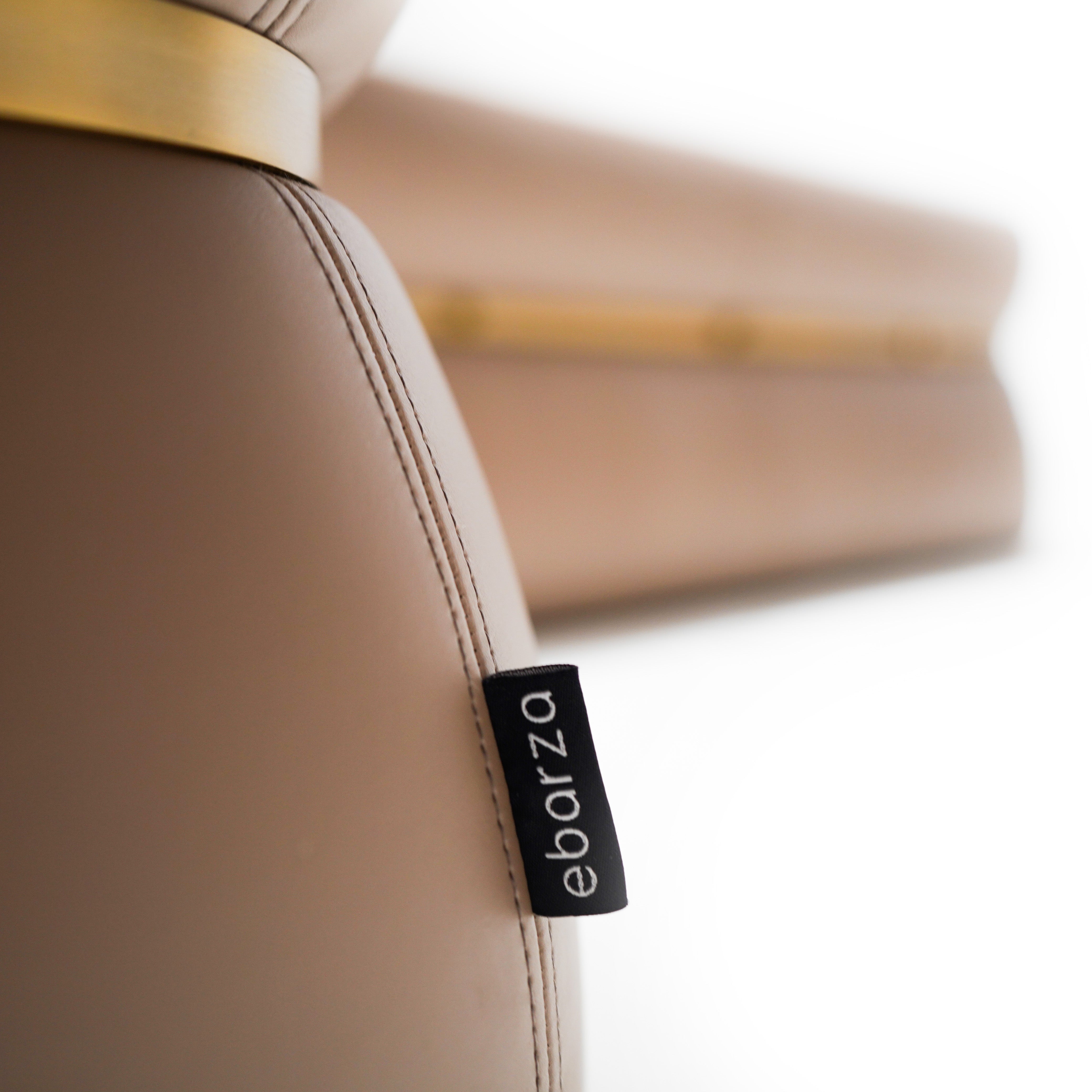 Light brown Nappa leather pouf by BEACON, model BC708-1, featuring soft, textured leather surface and round shape.