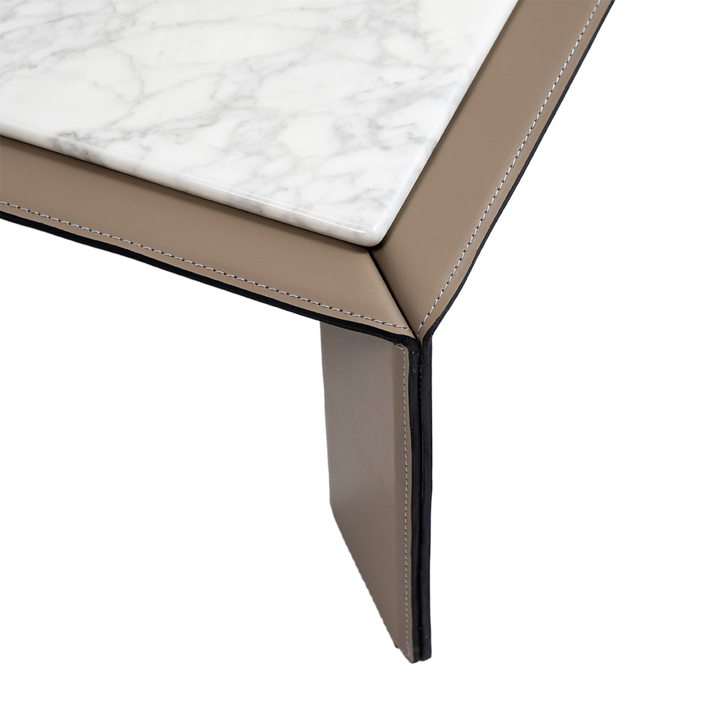 Natural Bianco Carrara Venato marble coffee table by BEACON, sleek design with white and gray veined marble surface.