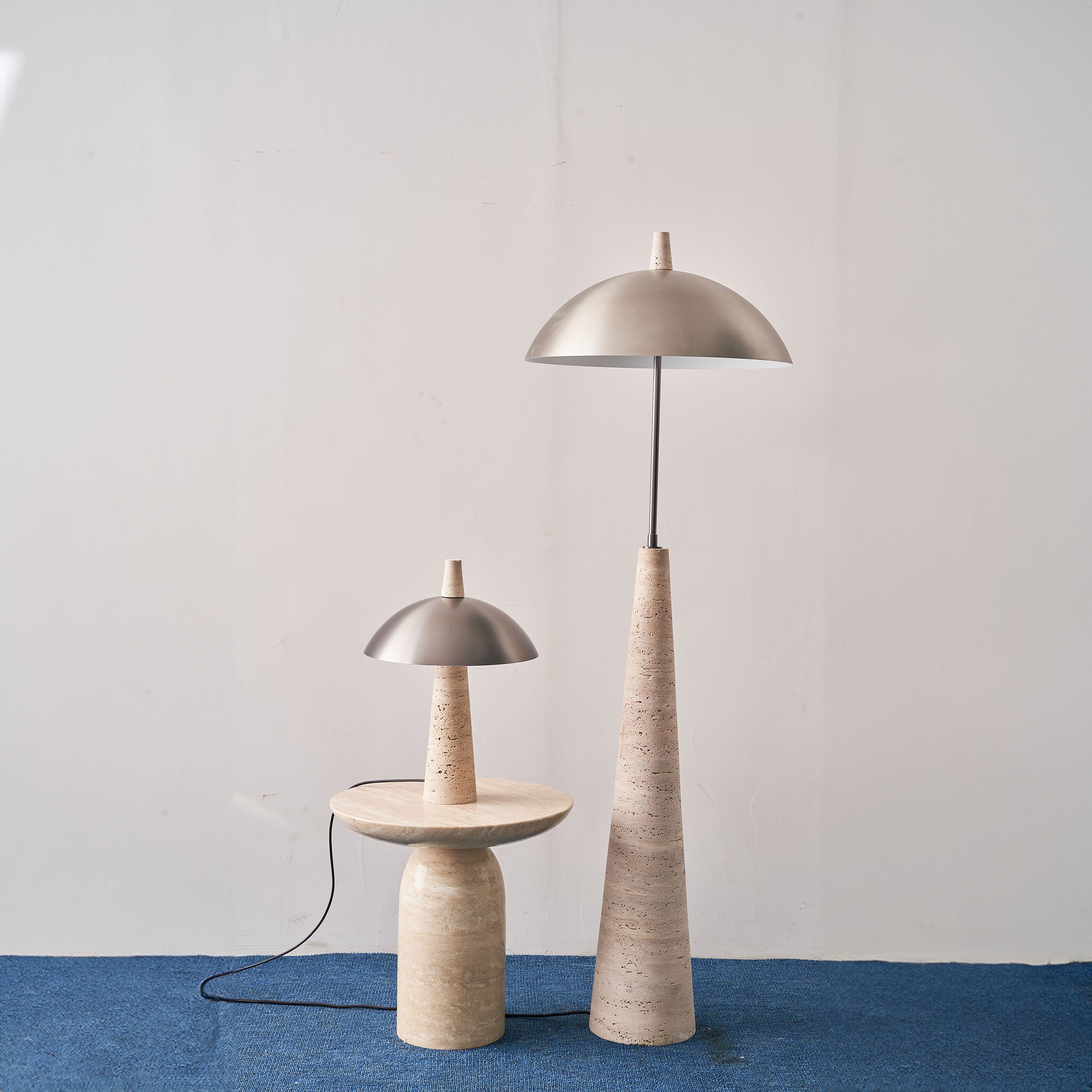 Natural travertine floor lamp by BEACON, JA-015F, showcasing a sleek, modern design with a stone finish and sturdy base.