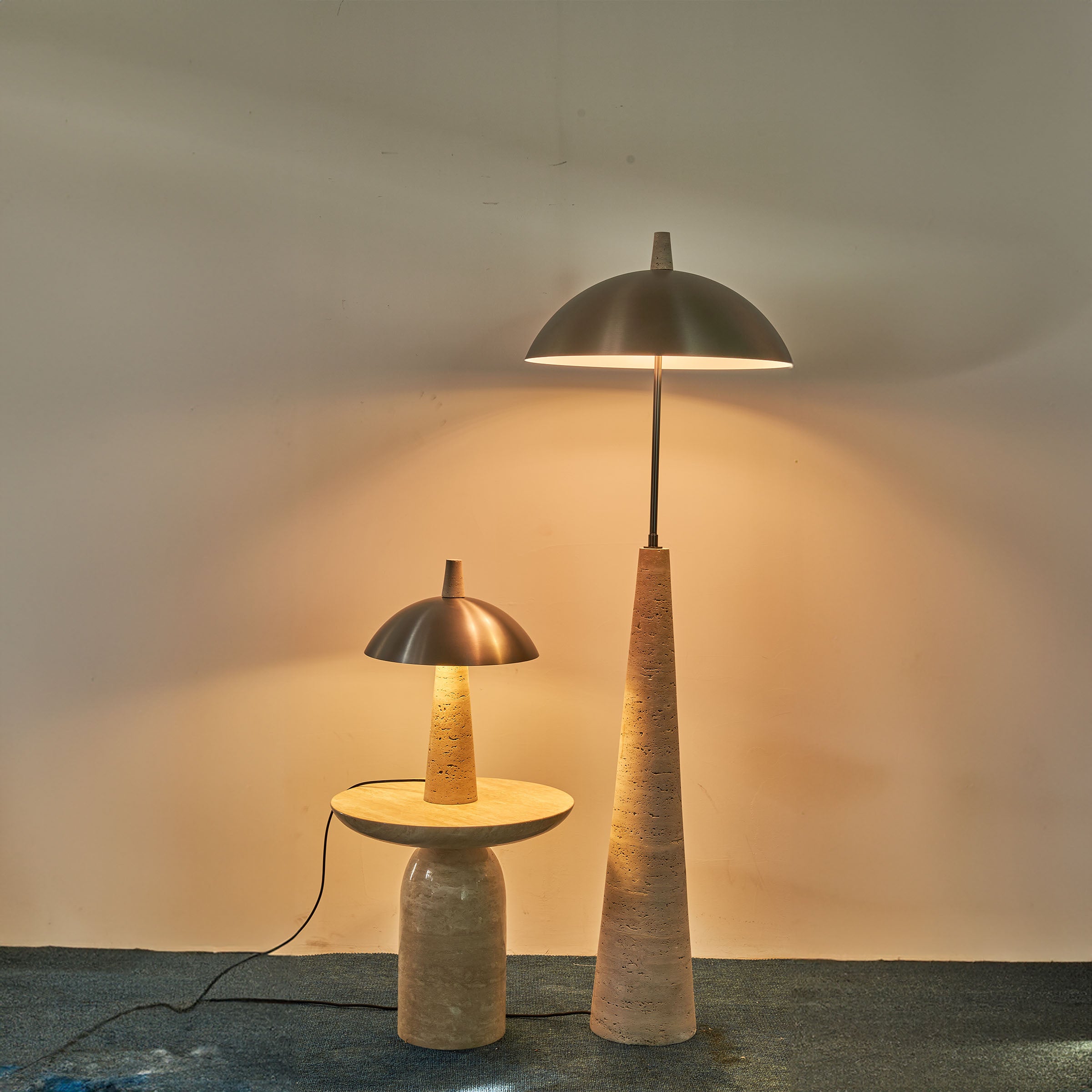 Natural travertine floor lamp by BEACON, model JA-015F, showcasing a sleek, modern design with a stone finish.