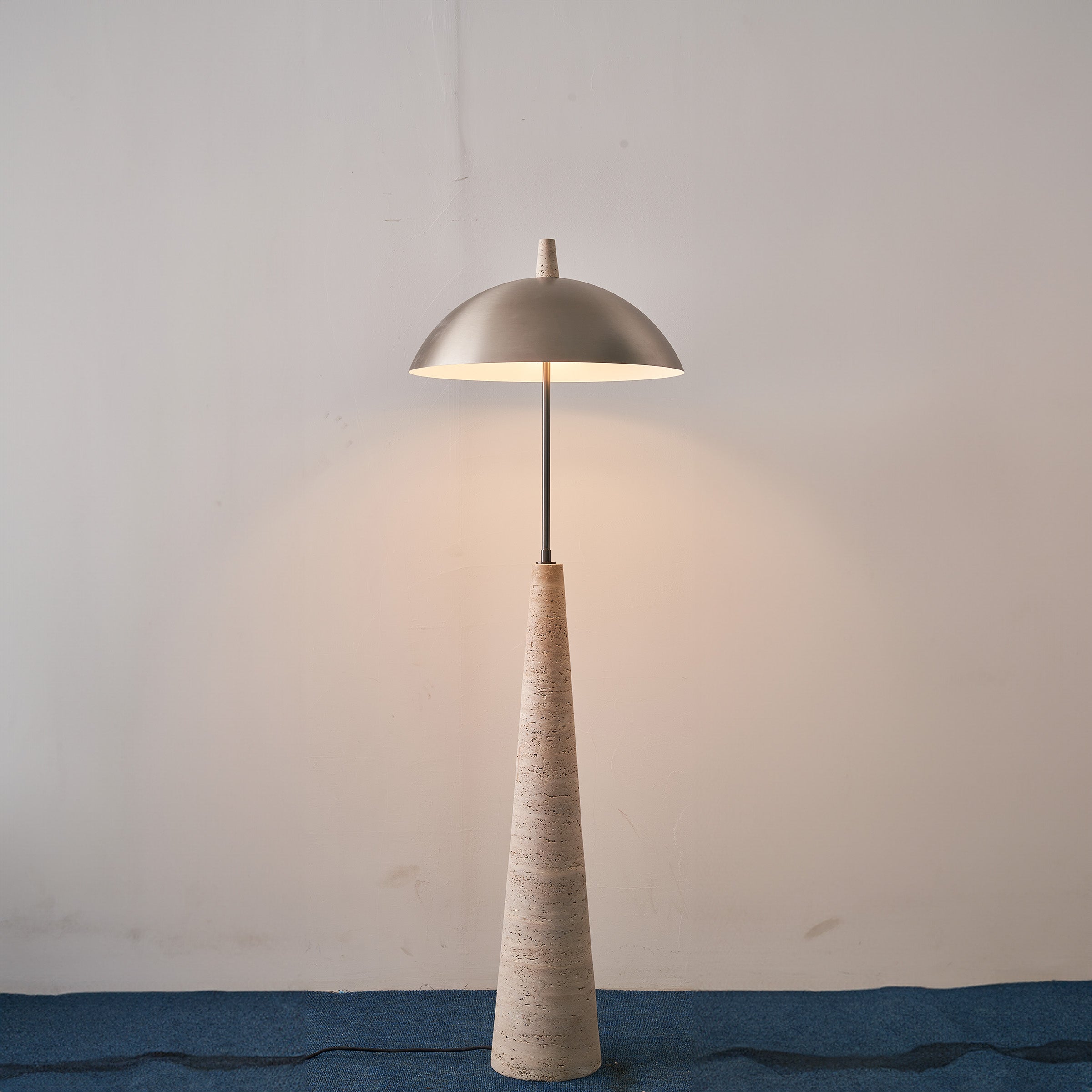 Natural travertine floor lamp by BEACON, JA-015F, featuring a sleek design and sturdy base, ideal for modern living spaces.