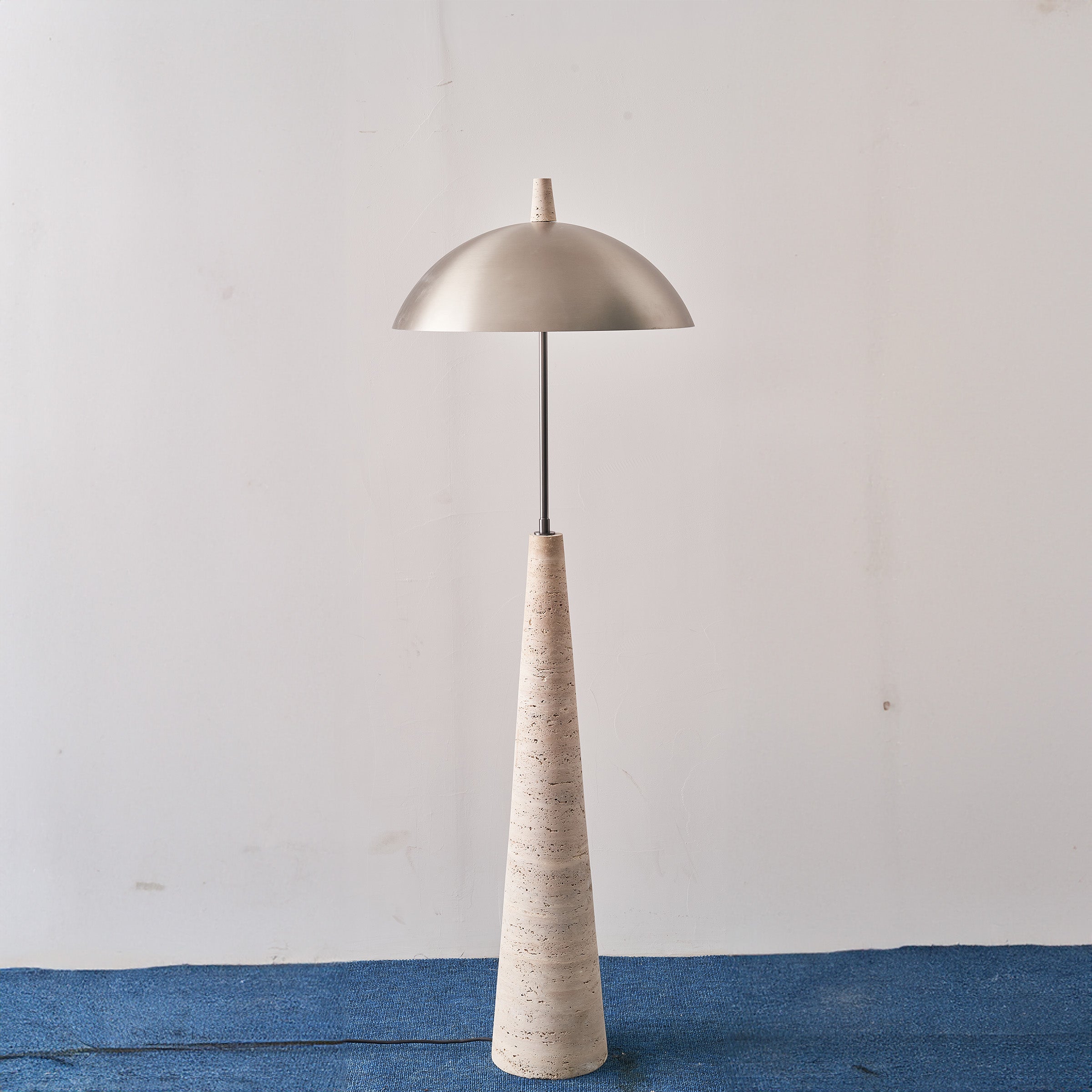 Natural travertine floor lamp by BEACON JIADG, modern design with textured stone finish, ideal for contemporary living spaces.