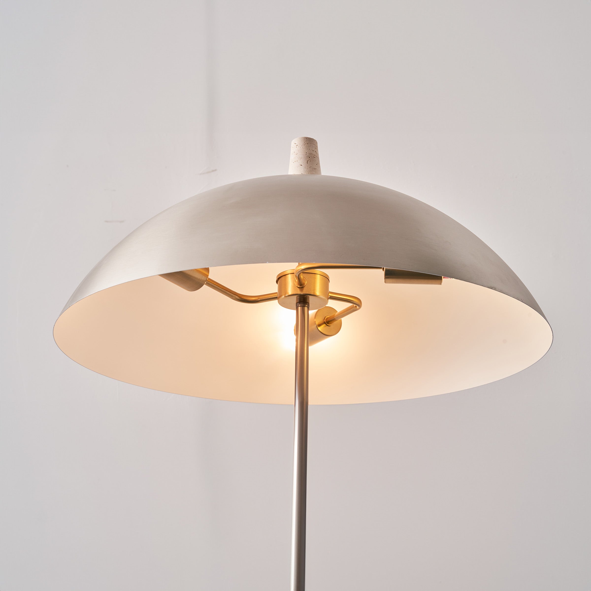 Natural travertine floor lamp by BEACON, JA-015F, showcasing a sleek, textured stone base and a modern floor lamp design.