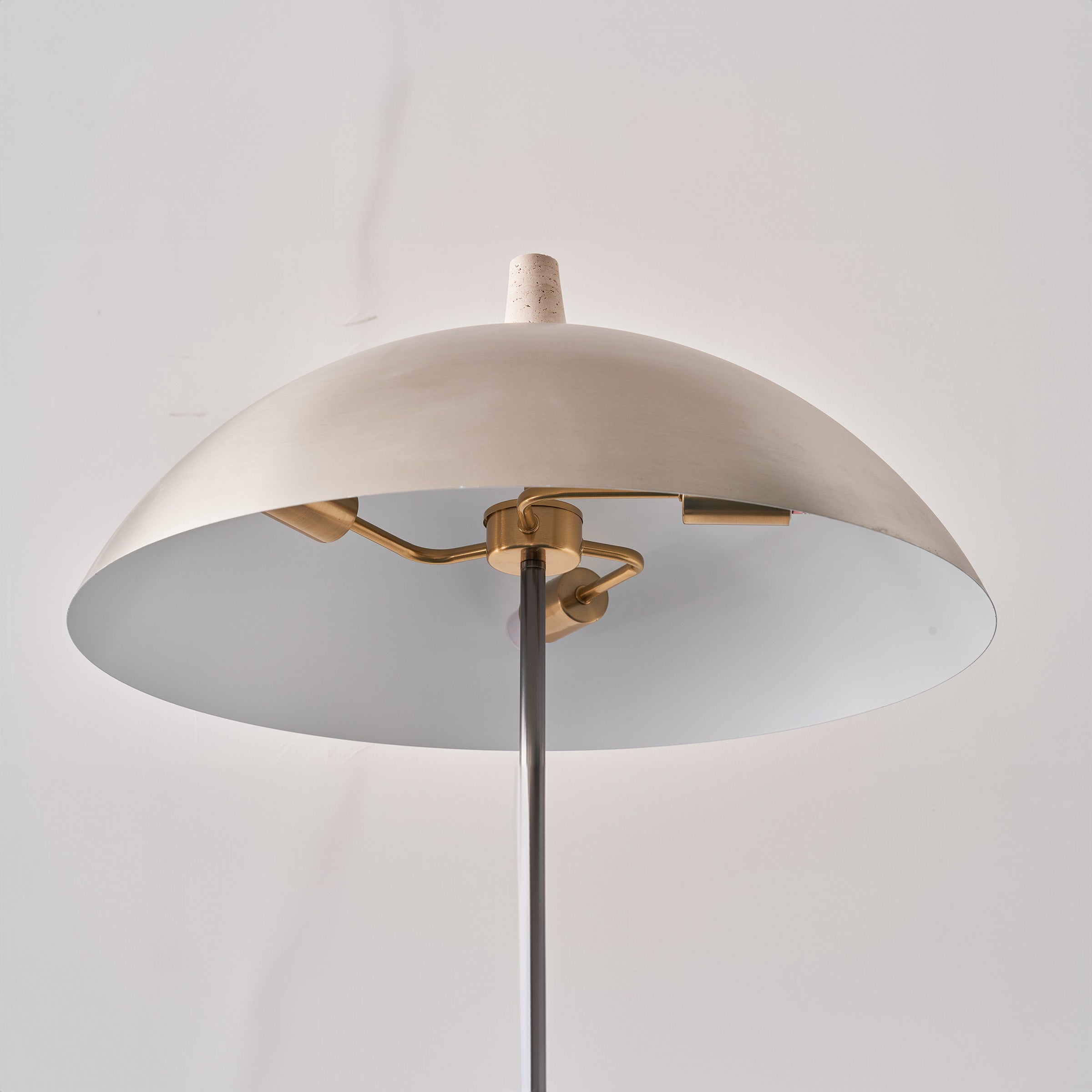 Natural travertine floor lamp by BEACON, model JA-015F, featuring a sleek, modern design with a textured stone finish.