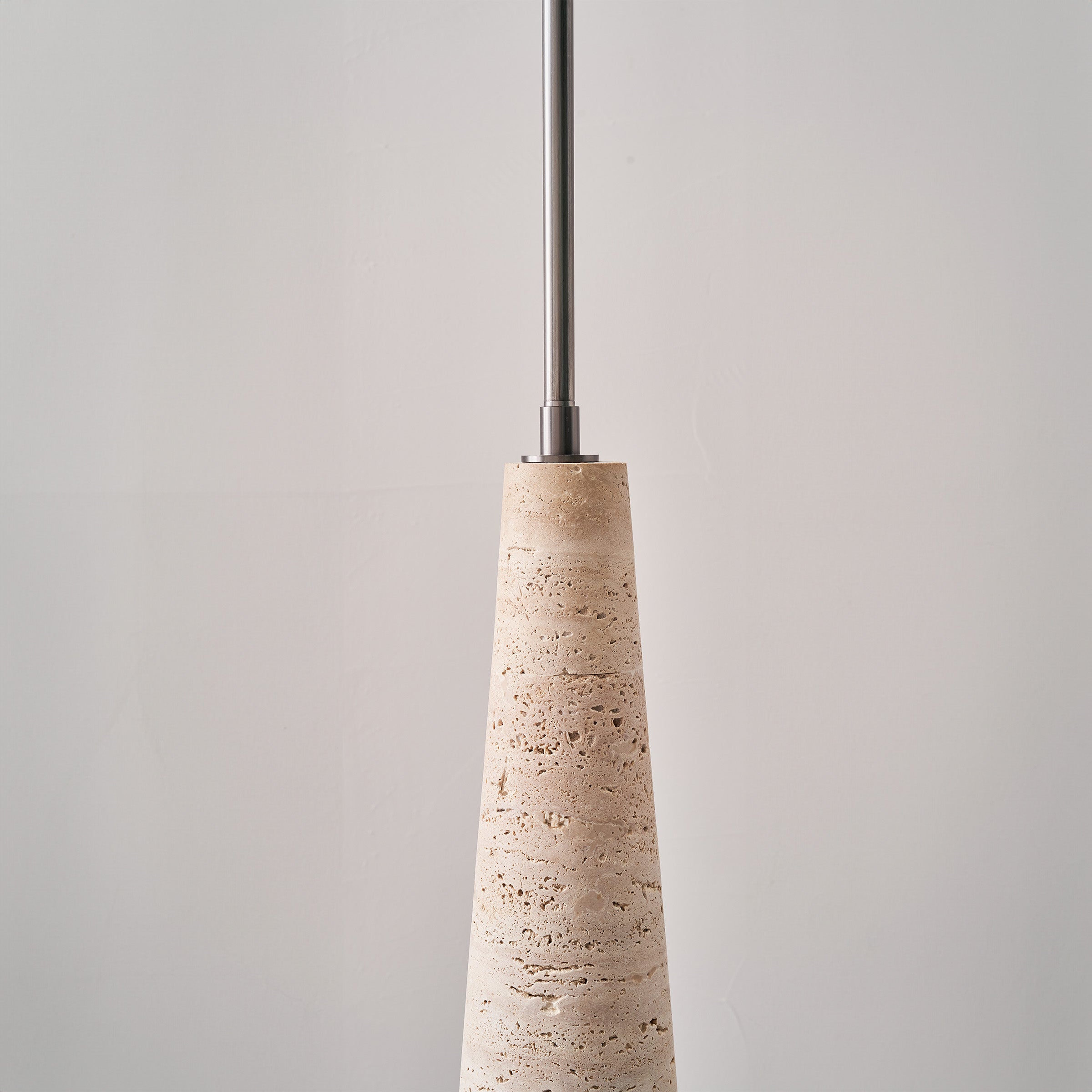 Natural travertine floor lamp by BEACON, JA-015F, featuring a sleek, modern design with a textured stone finish.