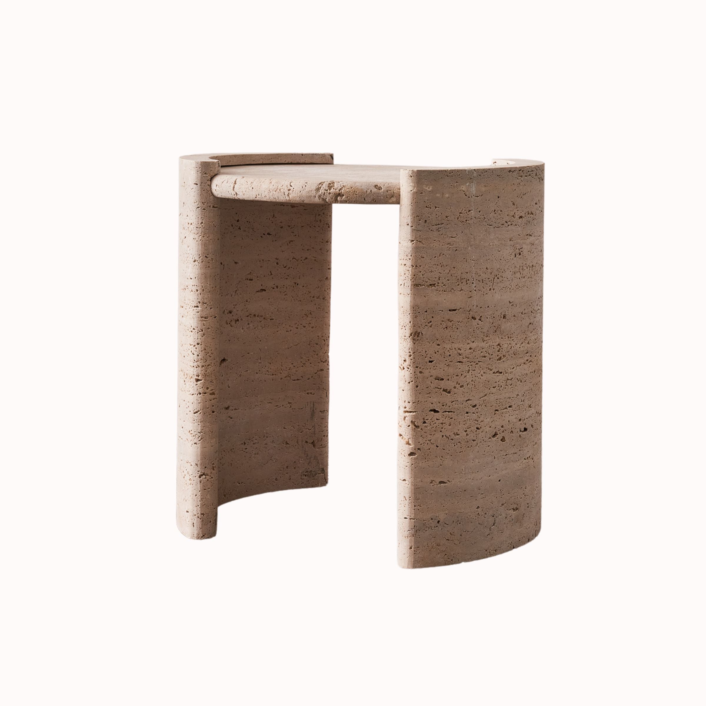 Natural travertine side table by BEACON with sleek rectangular top and sturdy base, perfect for modern living spaces.