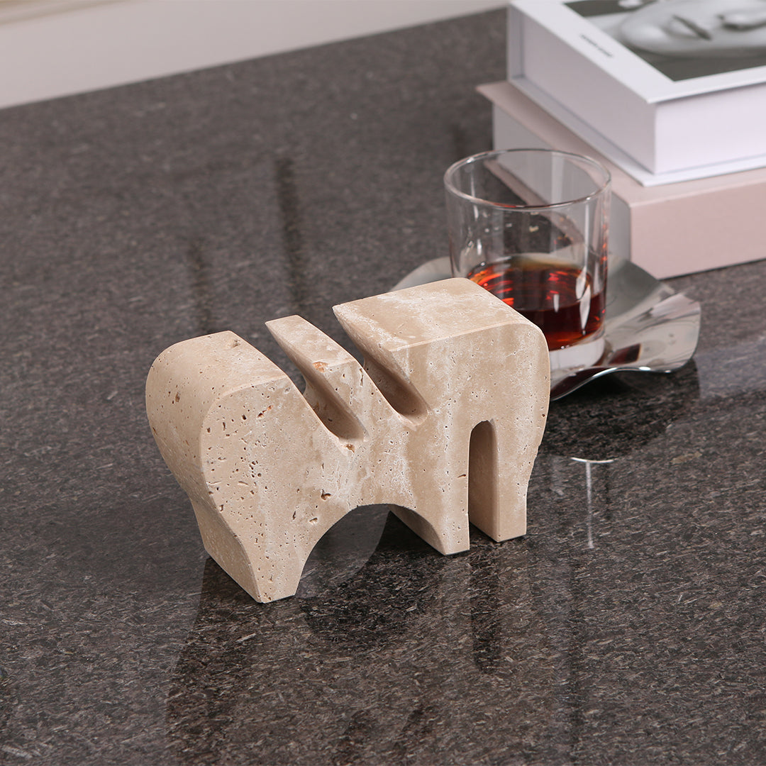 BEACON Nature’s Touch-Stone Card Holder for elegant desk organization, featuring a smooth, natural stone design and decorative home decor figurine.